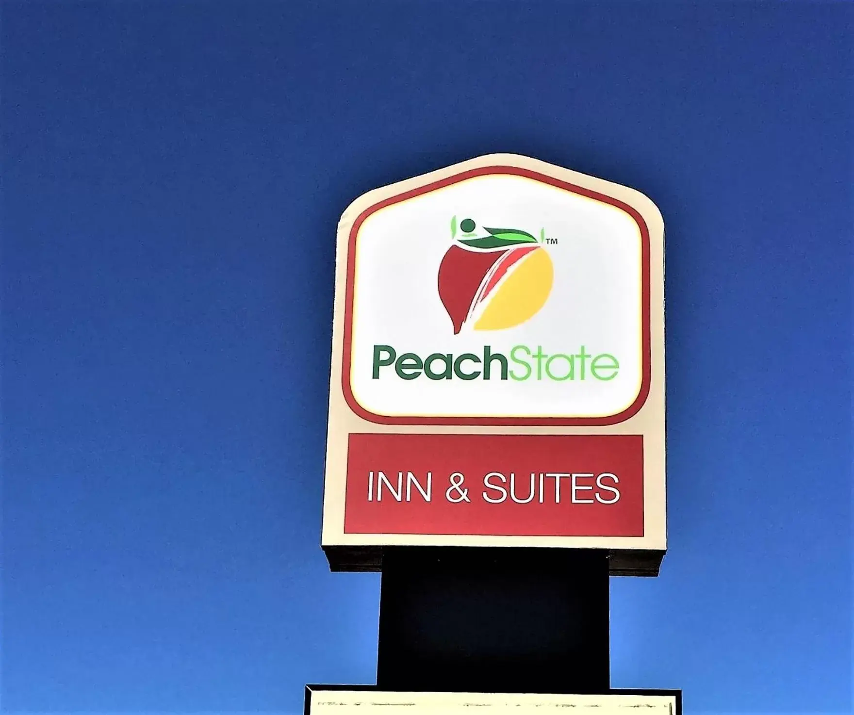 Property logo or sign in Peach State Inn & Suites
