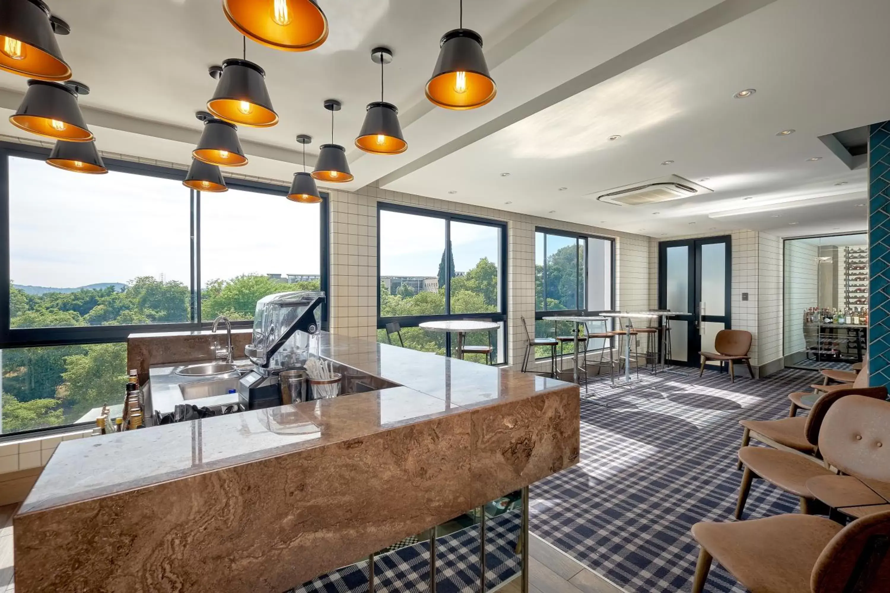 Lounge or bar in The Regency Apartment Hotel Menlyn