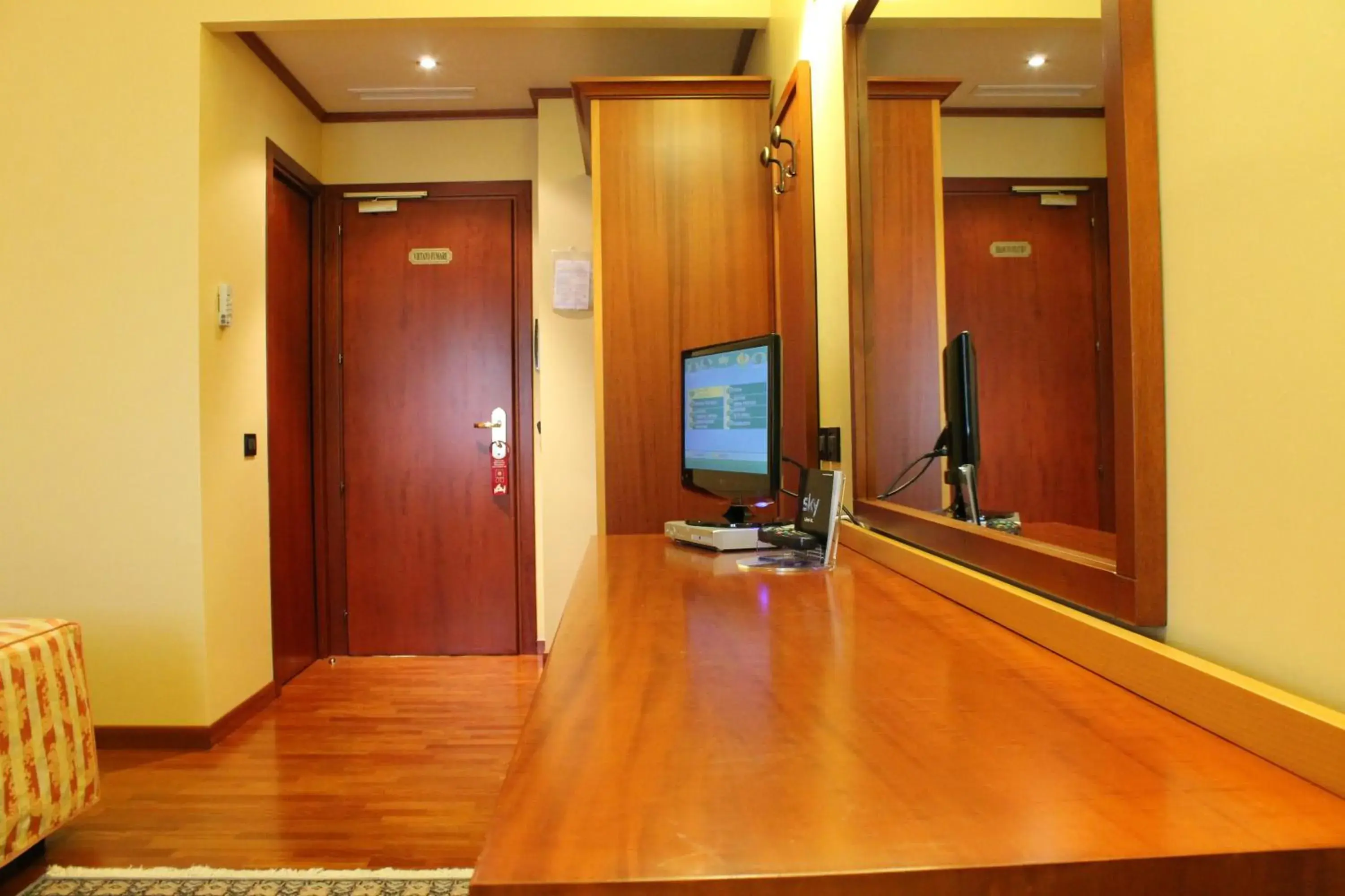 Seating area, TV/Entertainment Center in Hotel Grillo