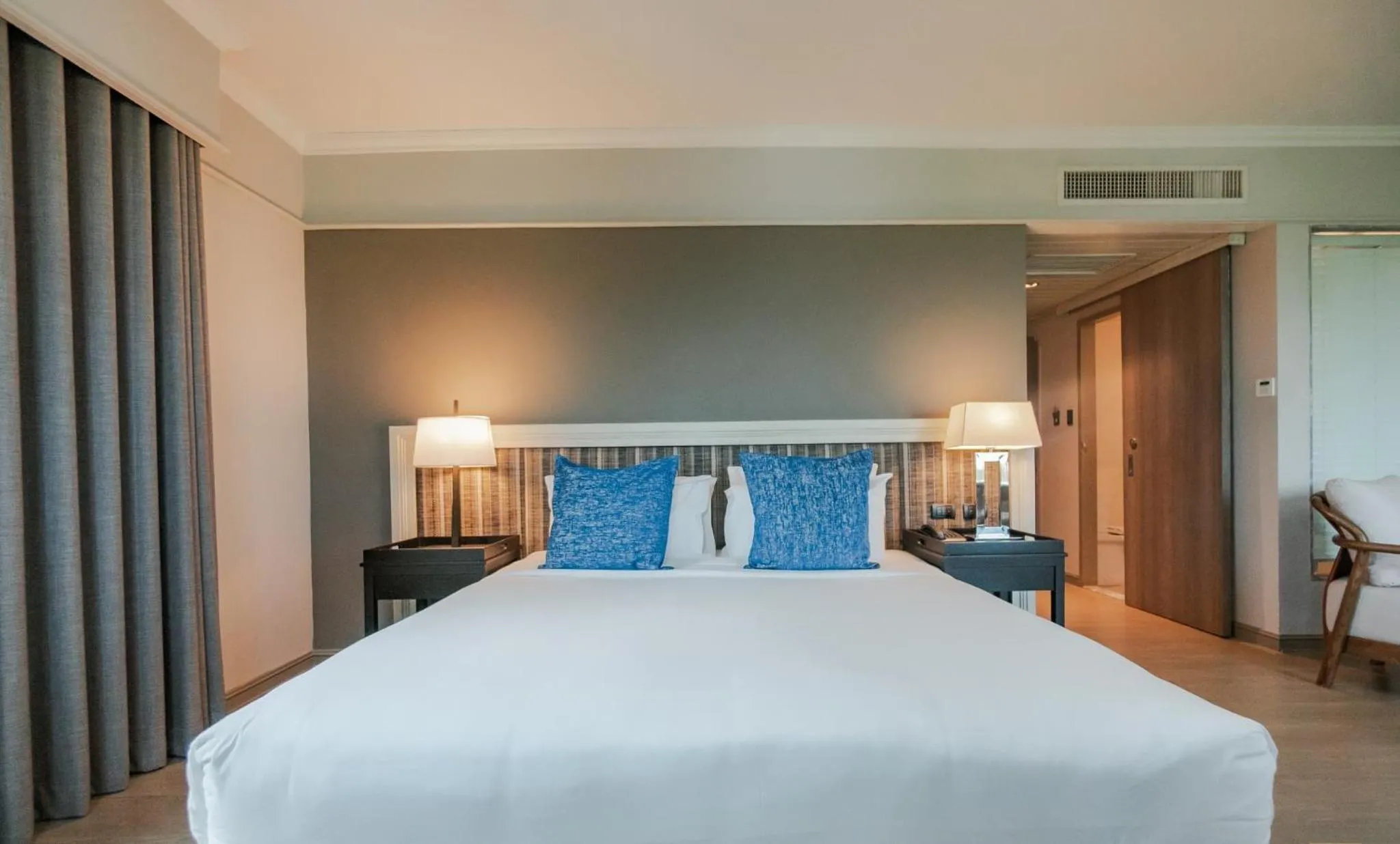 Bed in The Grand Riverside Hotel