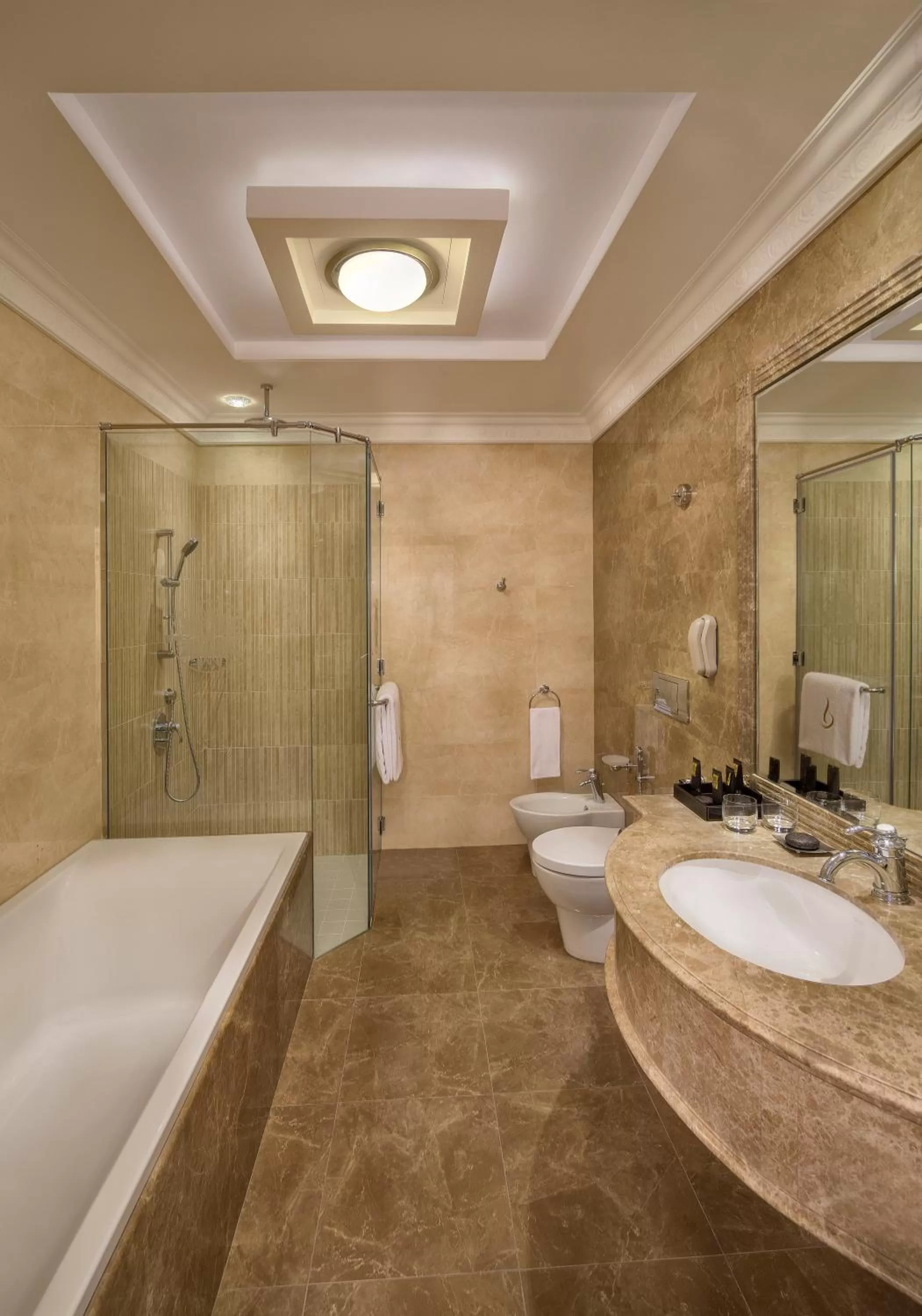 Toilet in Royal Rose Abu Dhabi, a Curio Collection by Hilton Affiliated Hotel
