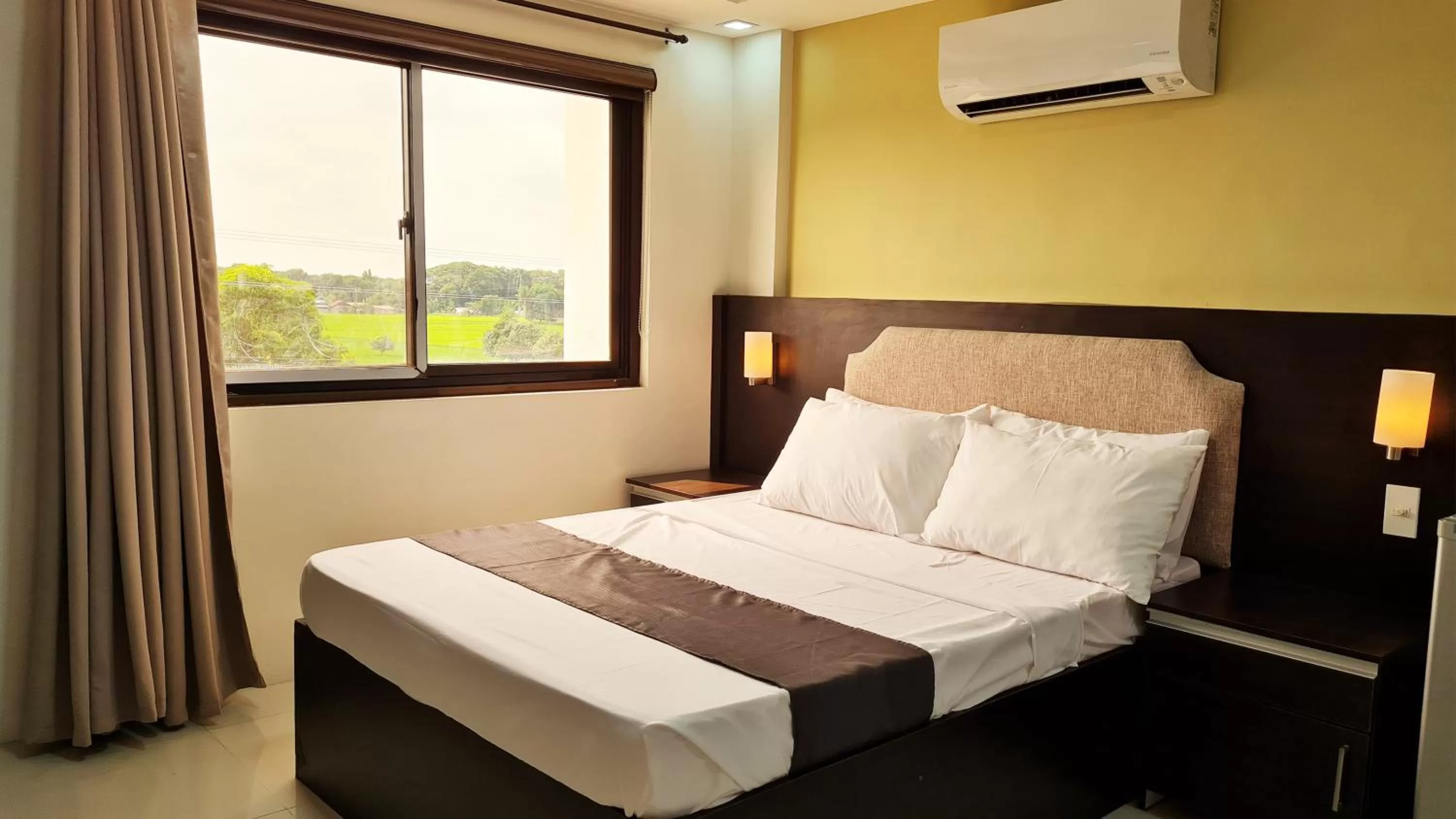 Bed in Staycation Hotel