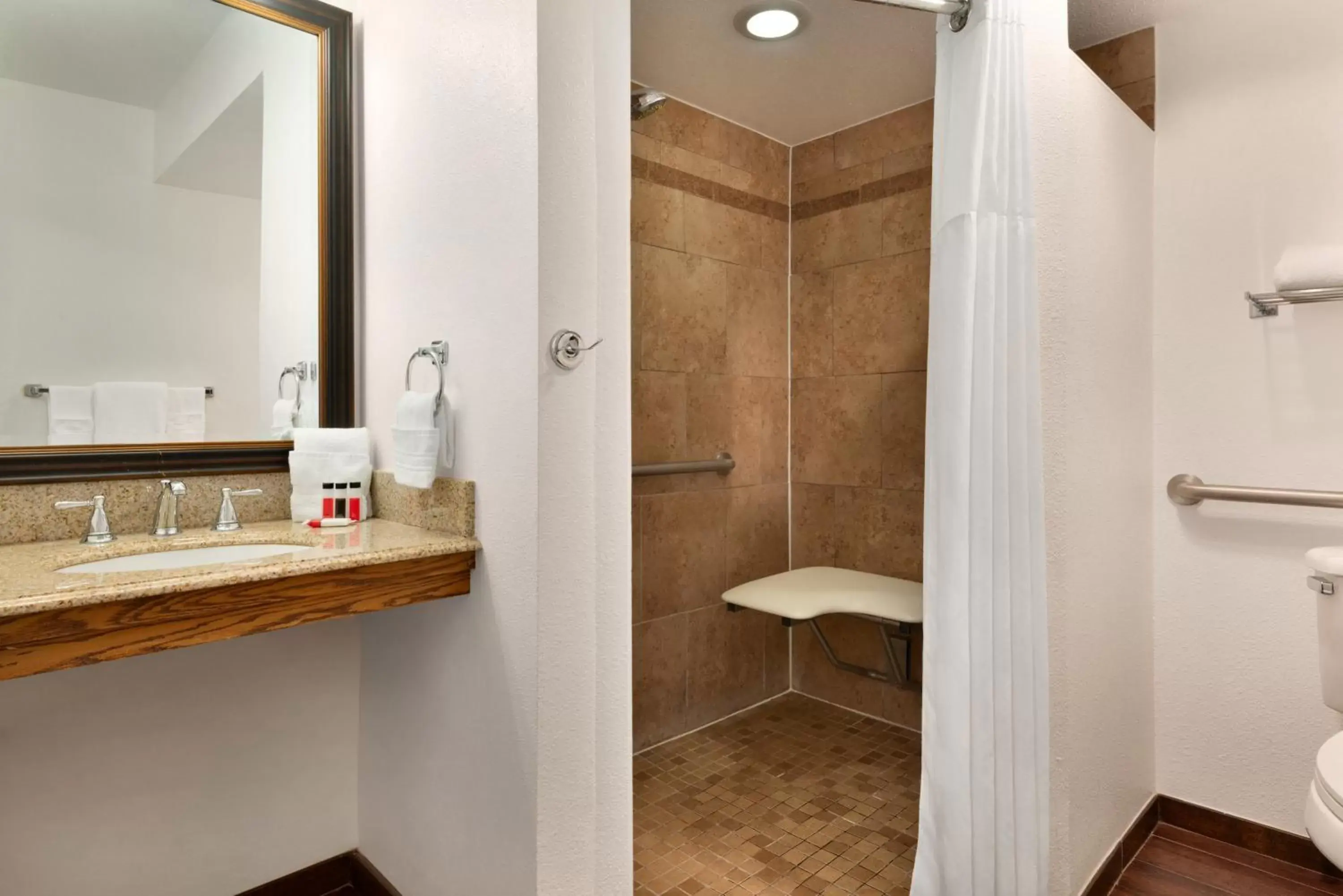 Bathroom in Ramada by Wyndham Spokane Airport