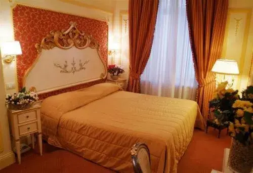 Bed in Hotel Champagne Palace