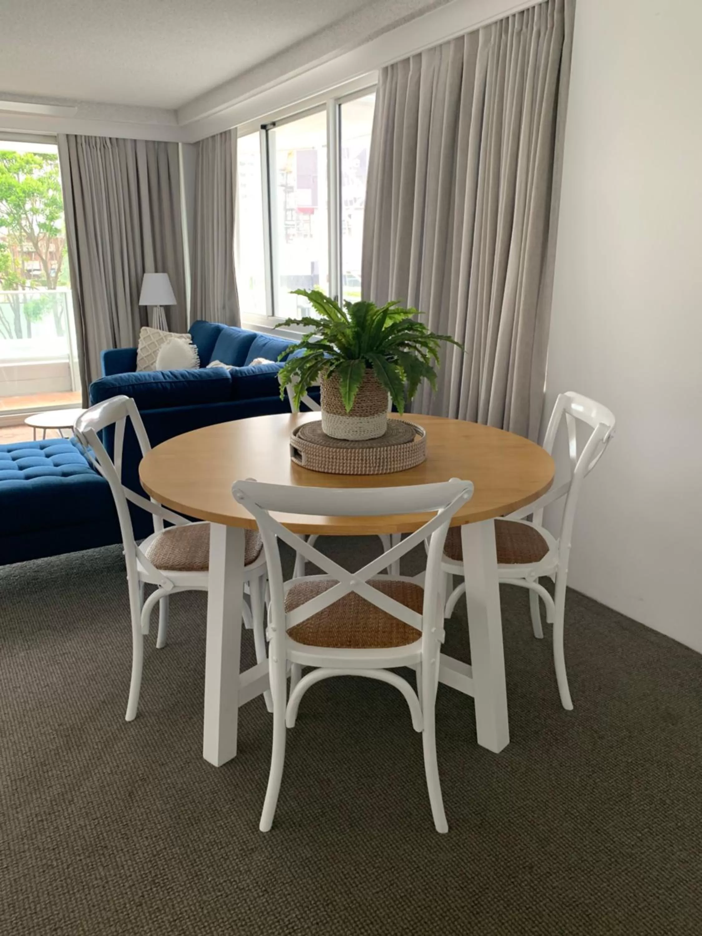 Dining area in Pacific Regis Beachfront Holiday Apartments