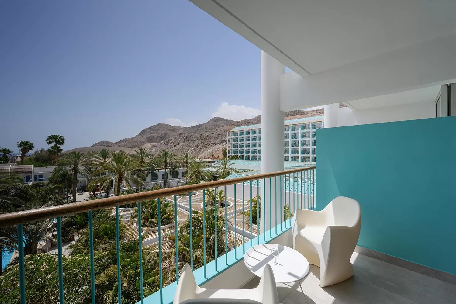 Seating area in Yam Suf by Isrotel Collection