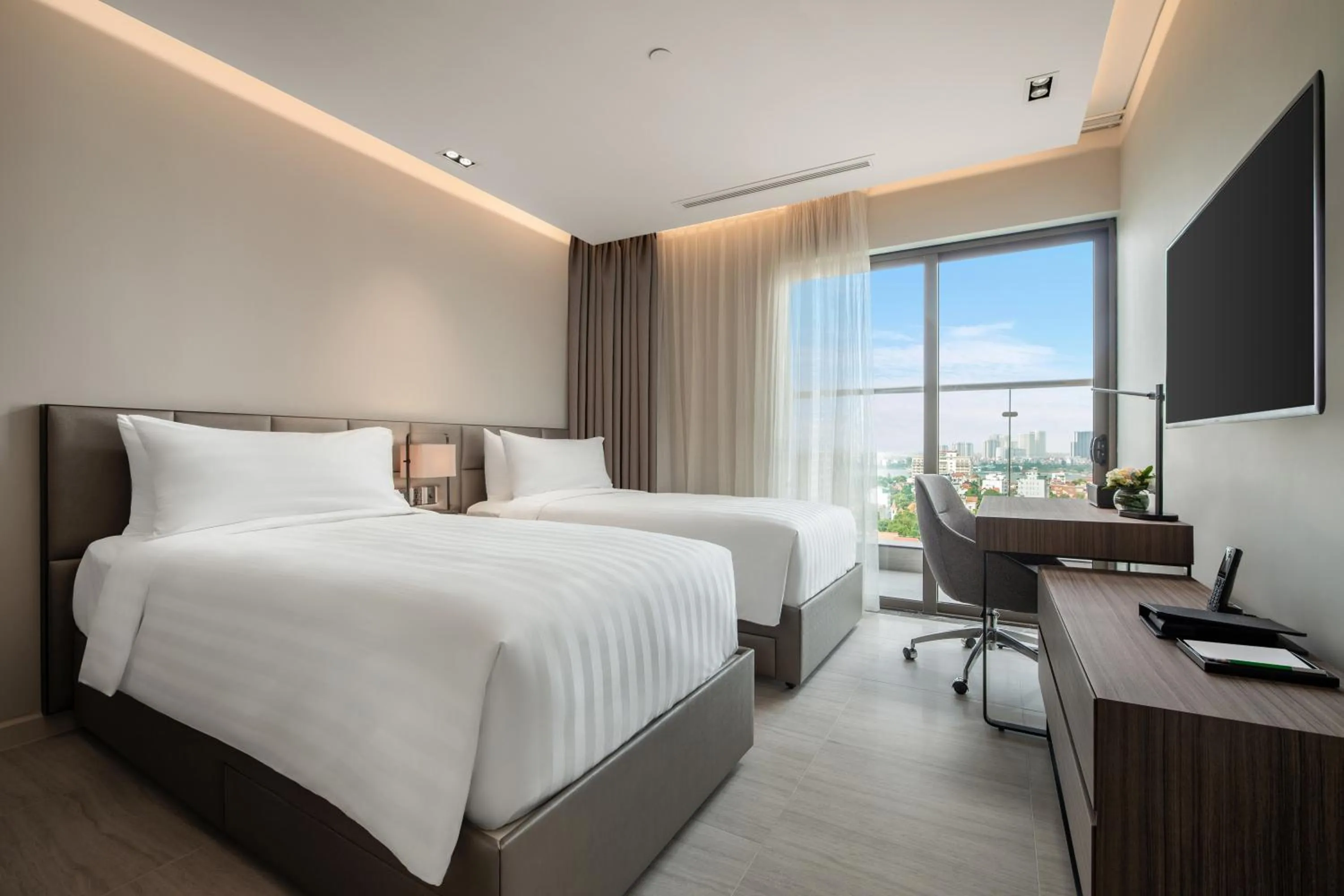 Bedroom, Bed in Oakwood Residence Hanoi