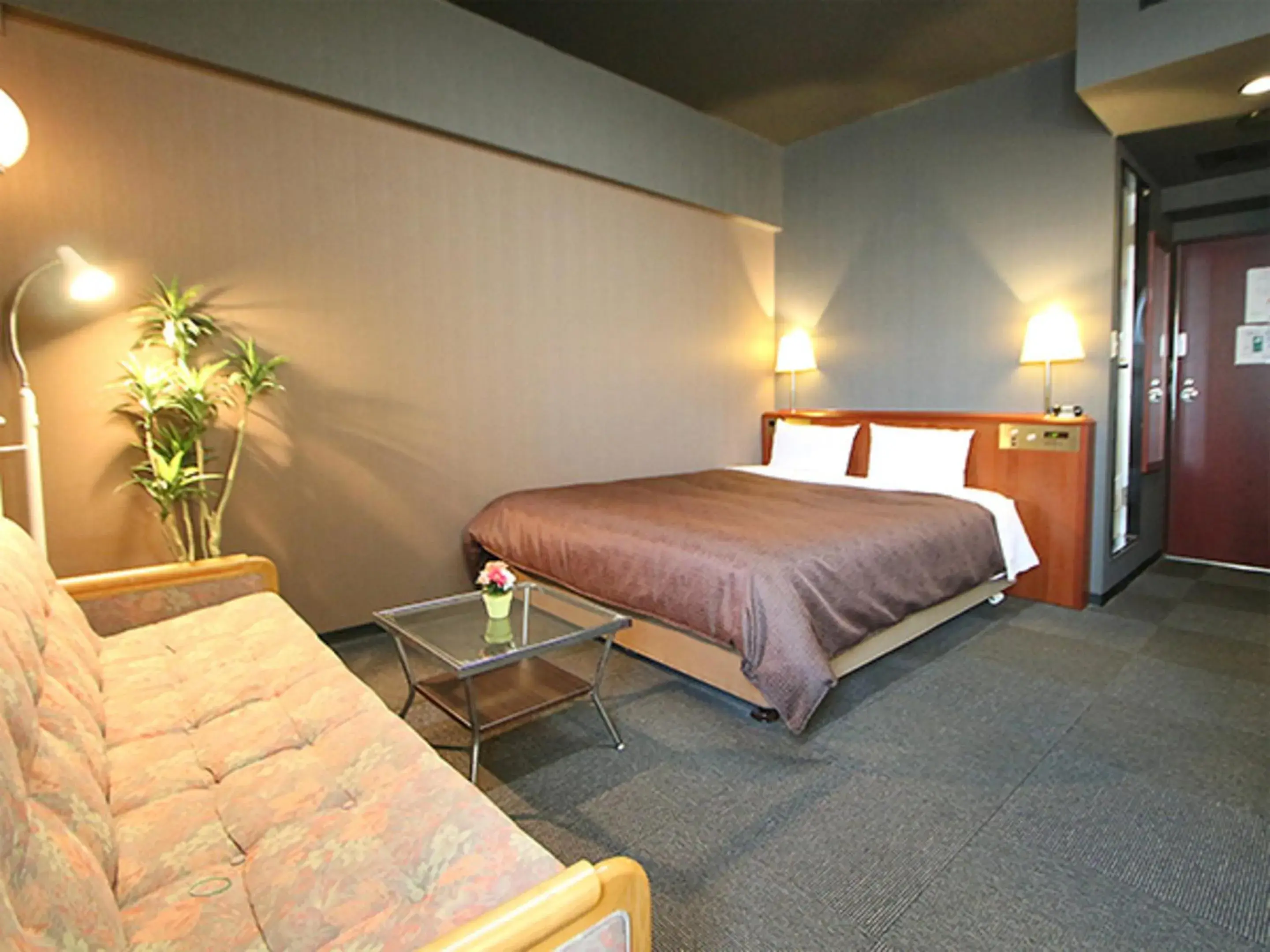 Bed in HOTEL LiVEMAX BUDGET Yokohama Tsurumi