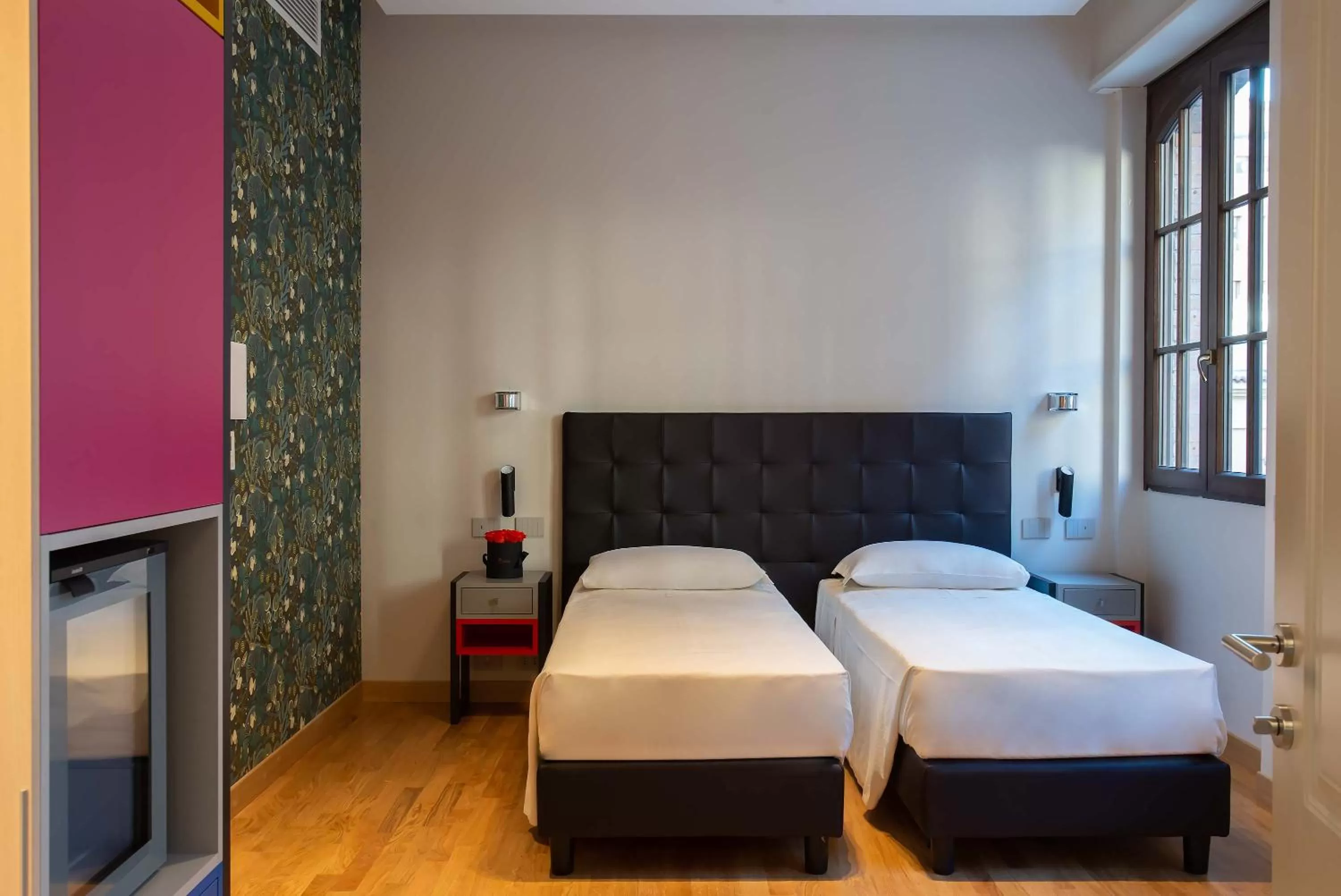 Bed in Albergo Etico Roma