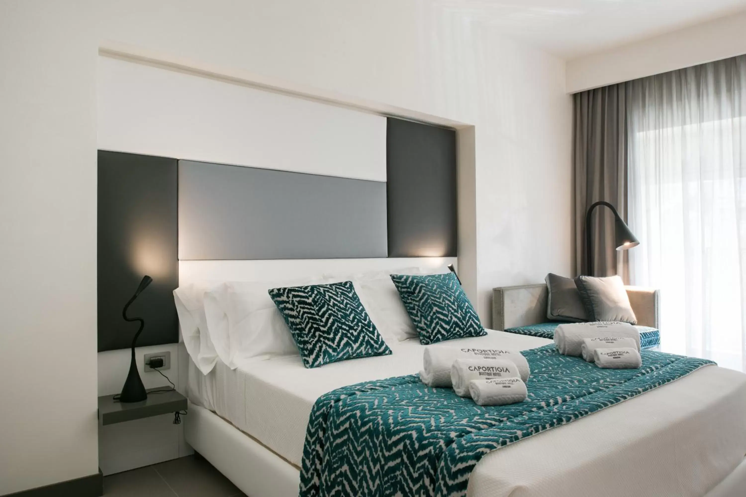 Bed in Caportigia Boutique Hotel