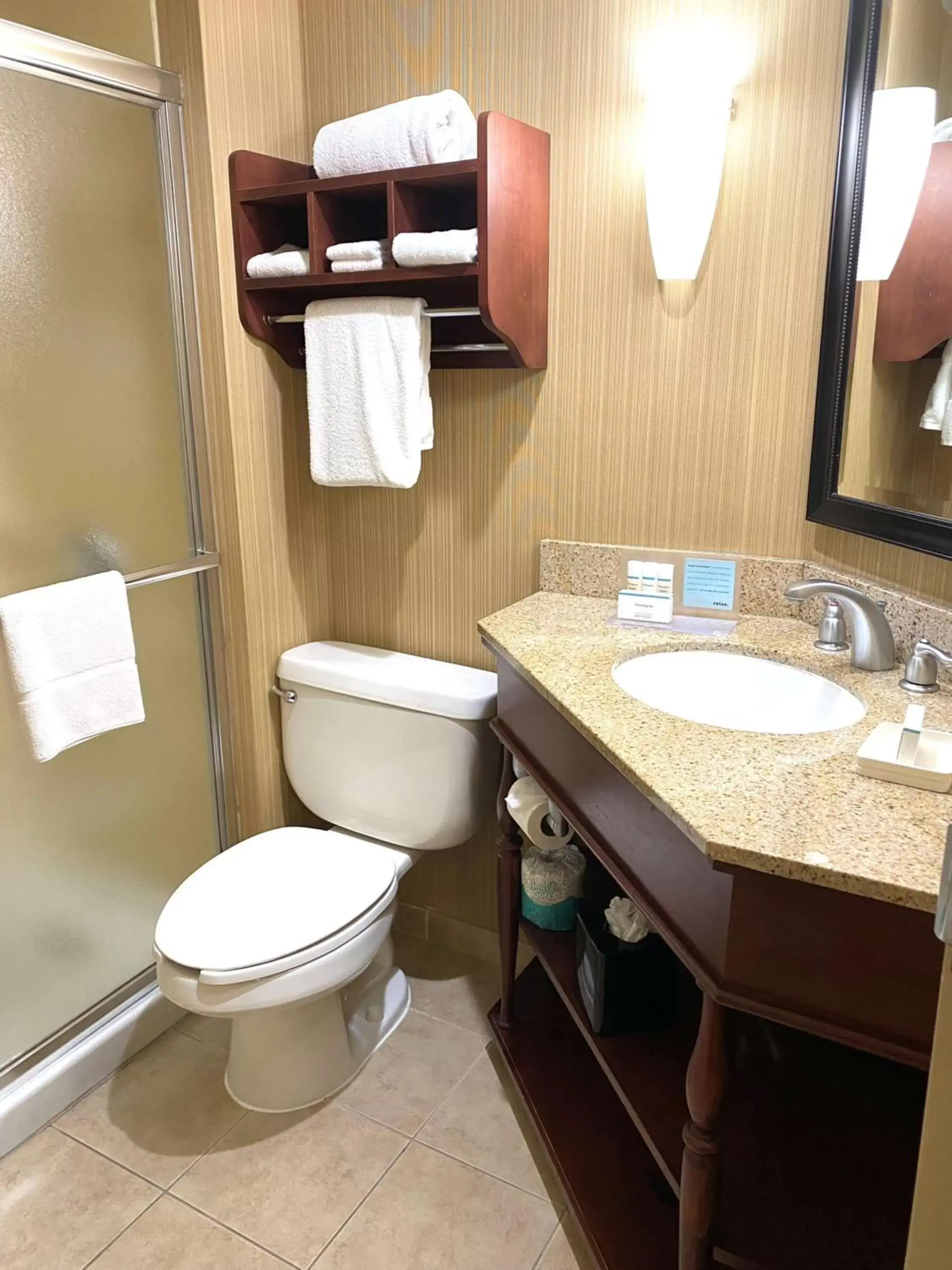 Bathroom in The Addison Hotel SureStay Collection by Best Western