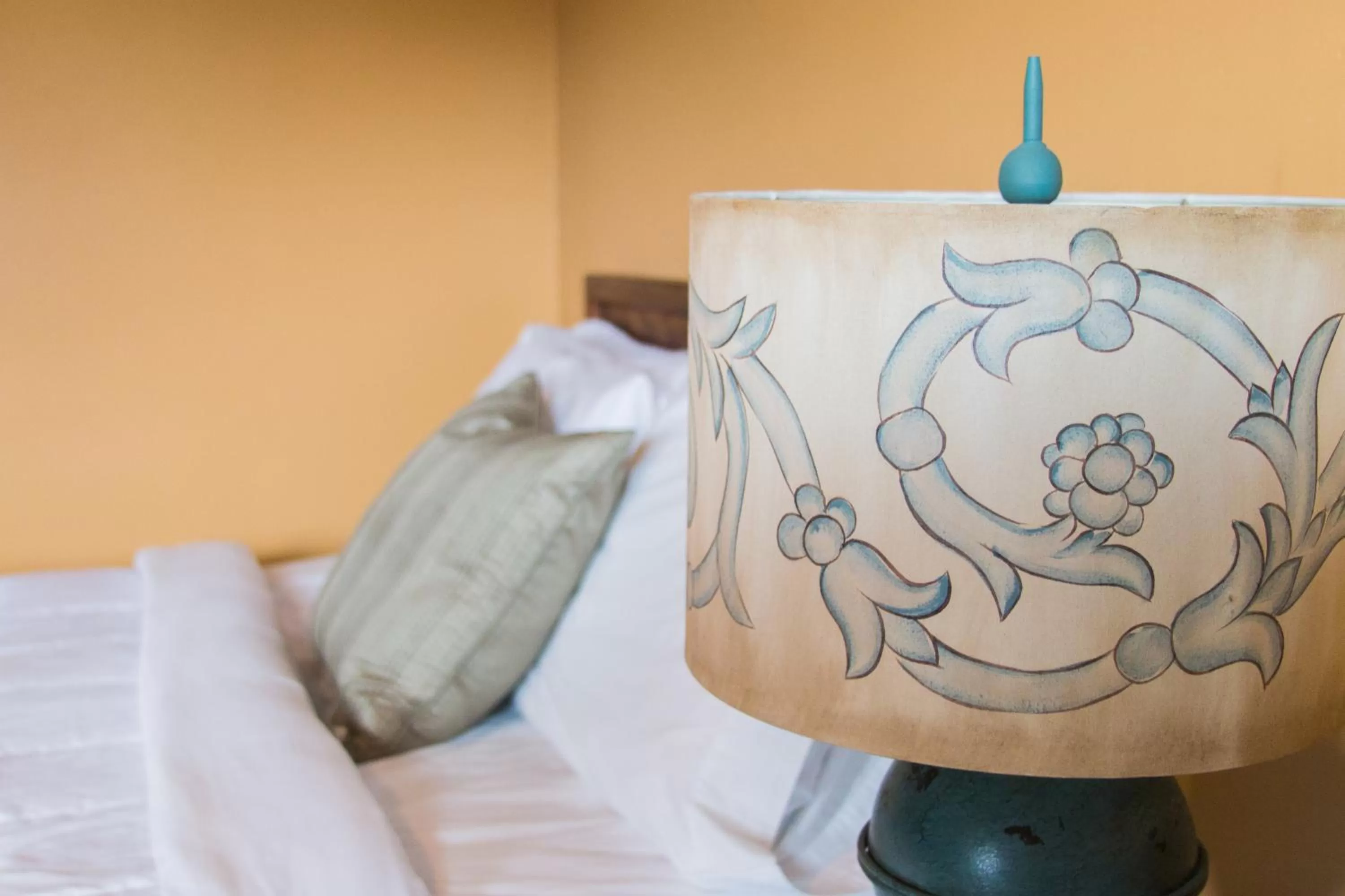 Decorative detail, Bed in Clarence Inn Extended Stay