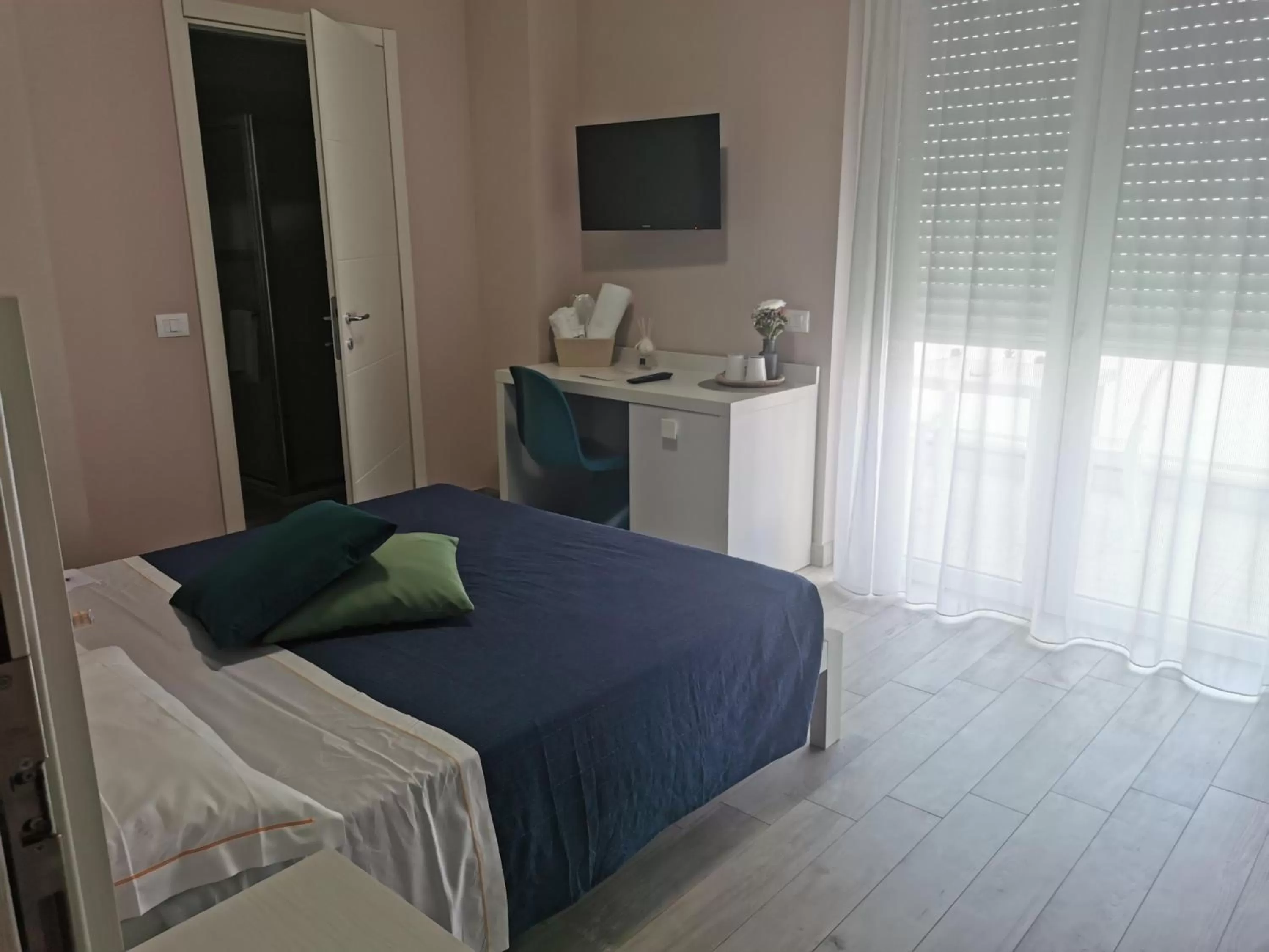 Bed in Elite Boutique Hotel