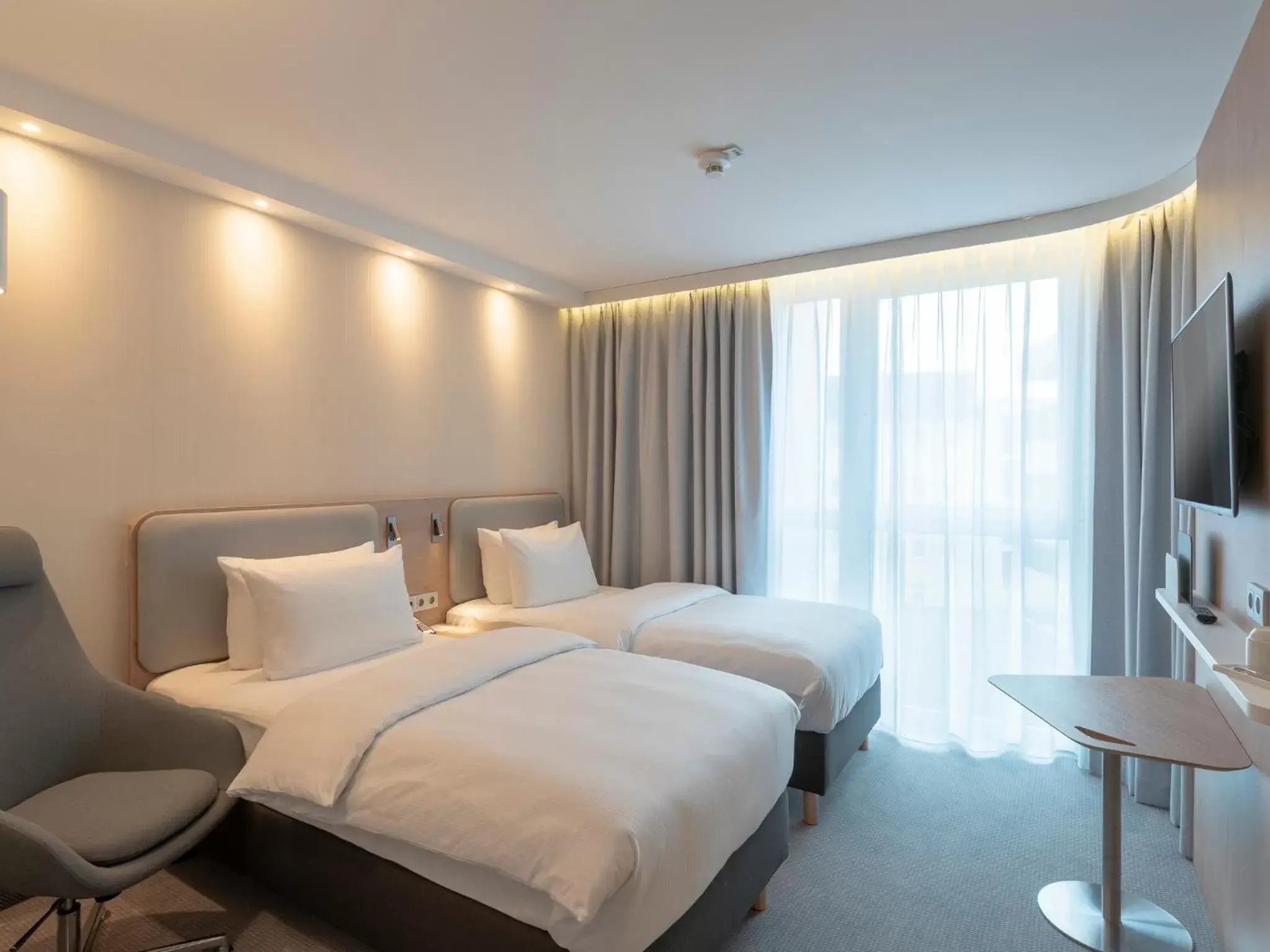 Bed in Holiday Inn Express - Offenbach by IHG Bed in Holiday Inn Express - Offenbach by IHG