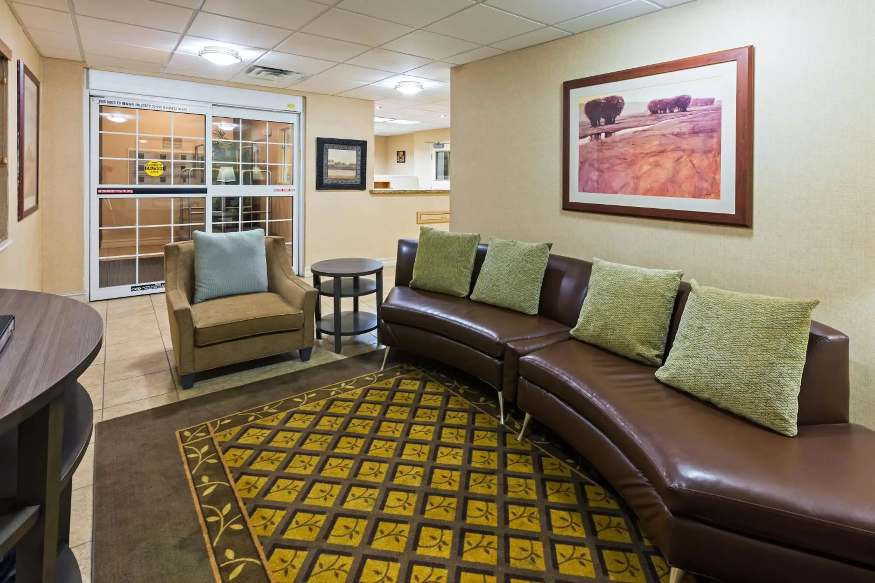 Property building, Seating Area in Candlewood Suites Owasso, an IHG Hotel