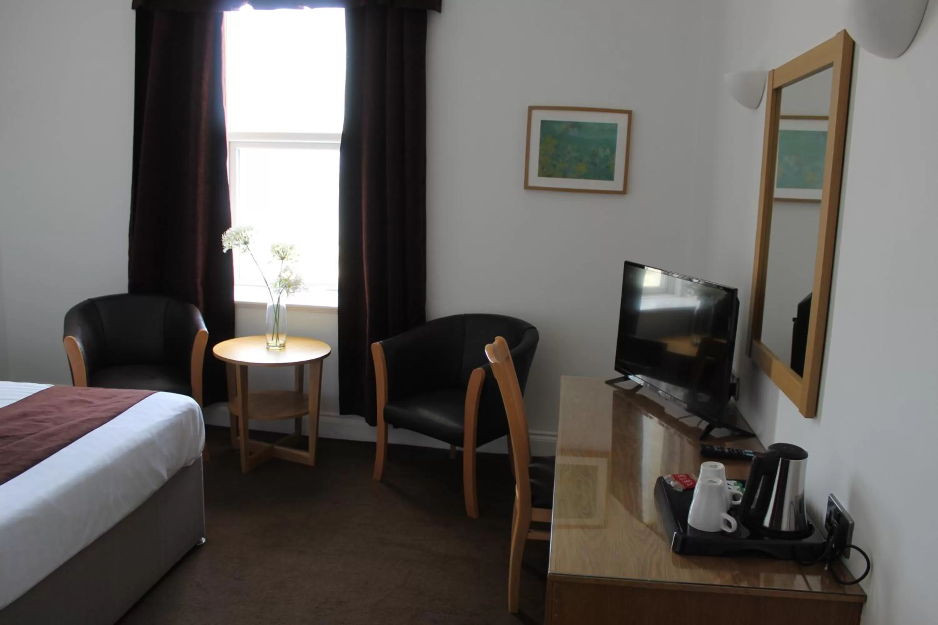 Seating area, Bed in Four Saints Brig Y Don Hotel