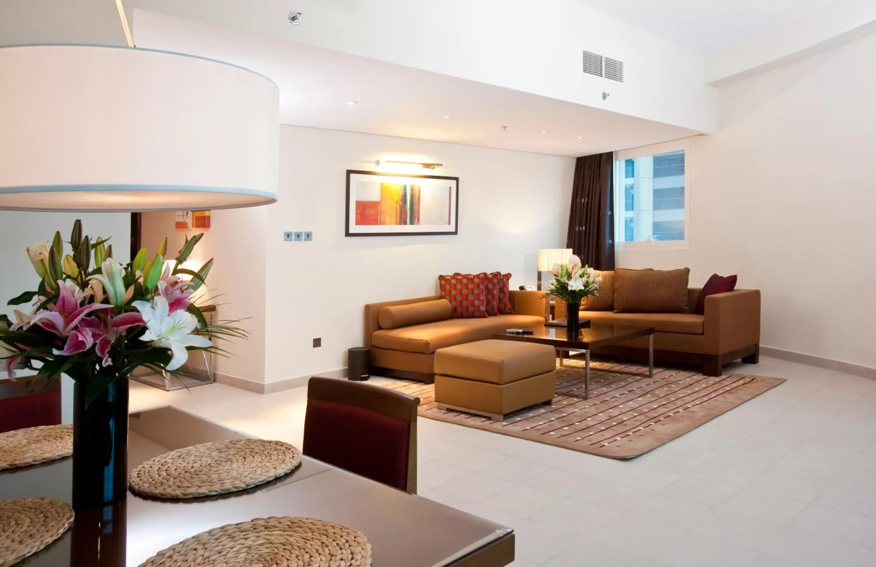 Living room, Seating Area in Grand Millennium Al Wahda Hotel and Executive Apartments Abu Dhabi