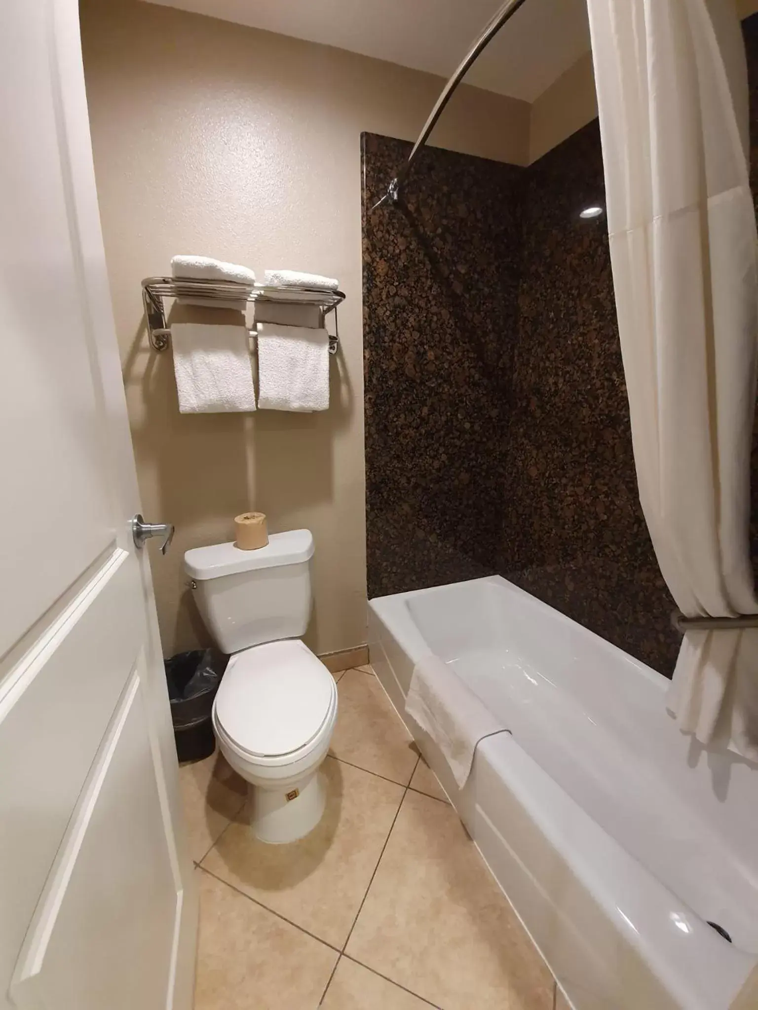 Bathroom in Super 8 by Wyndham Cypress Buena Park Area