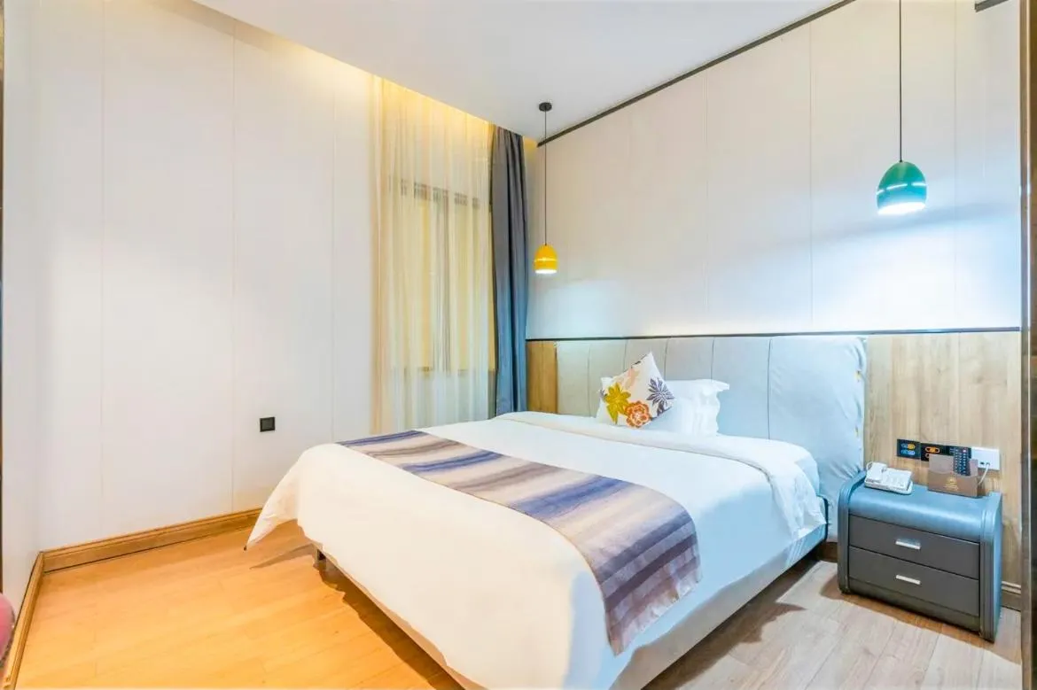 Bedroom in Guangzhou Nuomo International Hotel-Canton Fair Free Shuttle Bus