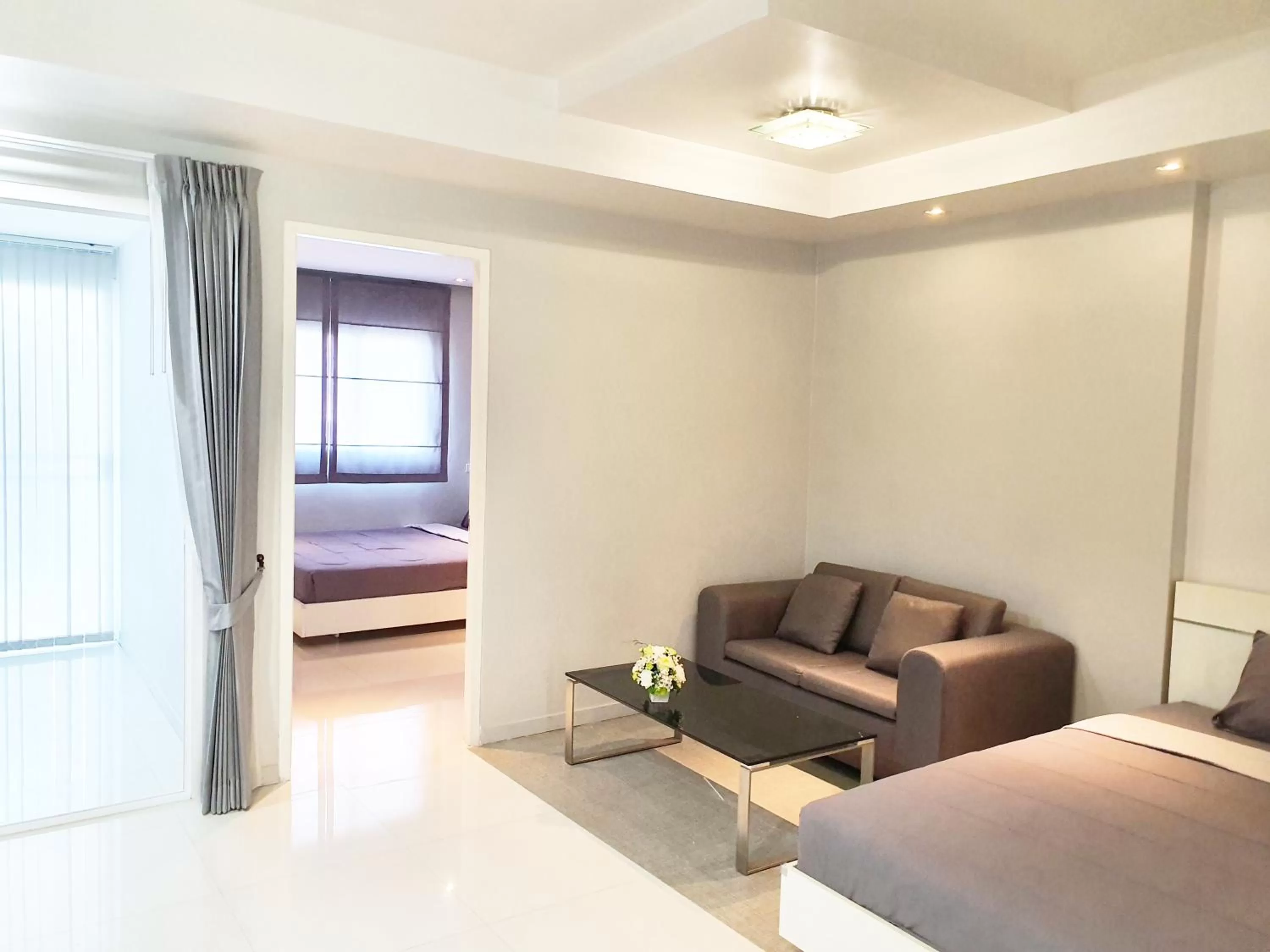 Photo of the whole room, Bed in The Sriracha Residence