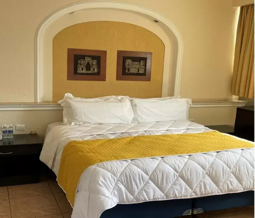 Bed in Hotel Los Aluxes