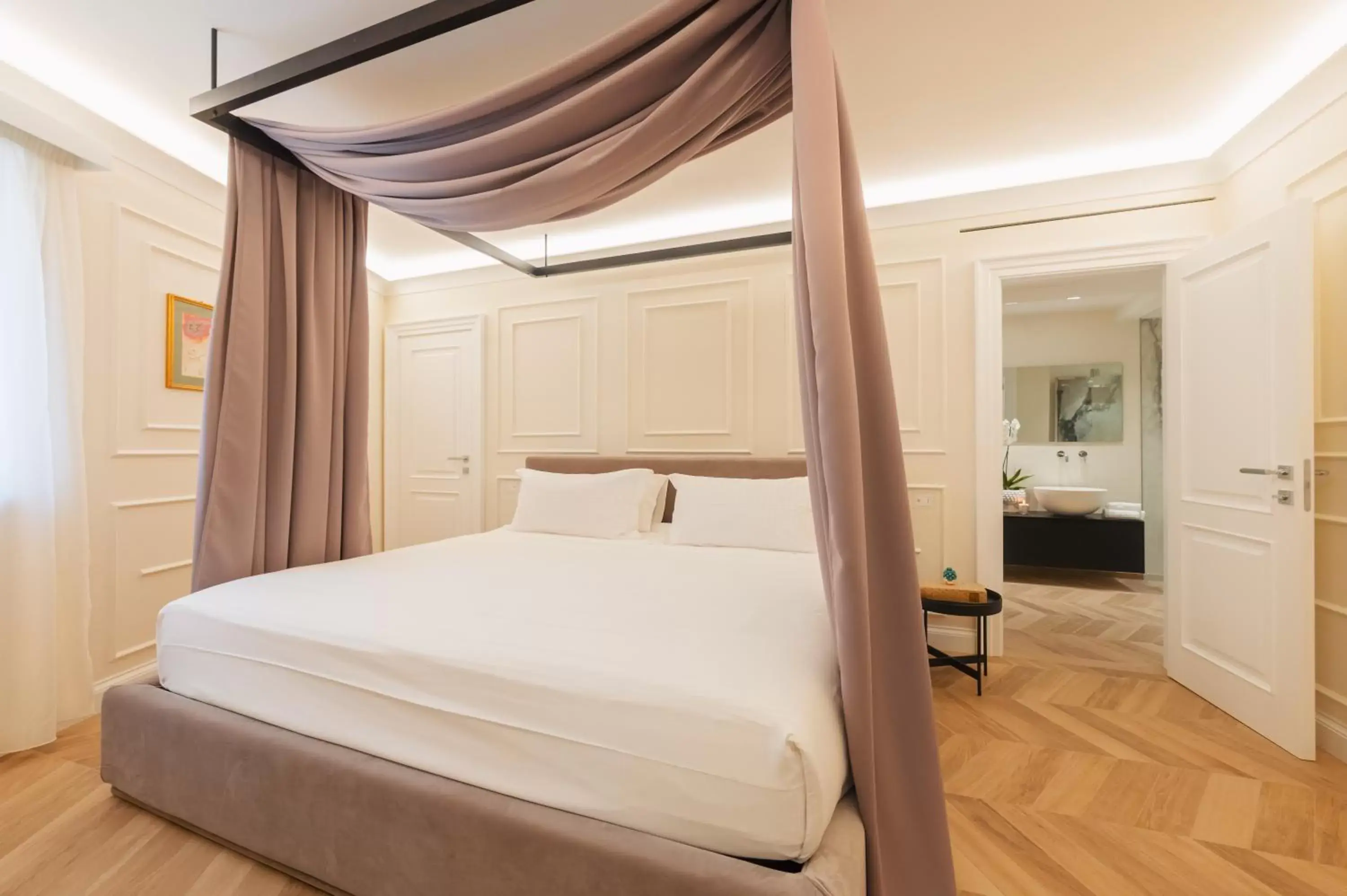 Bed in Naxi Suites