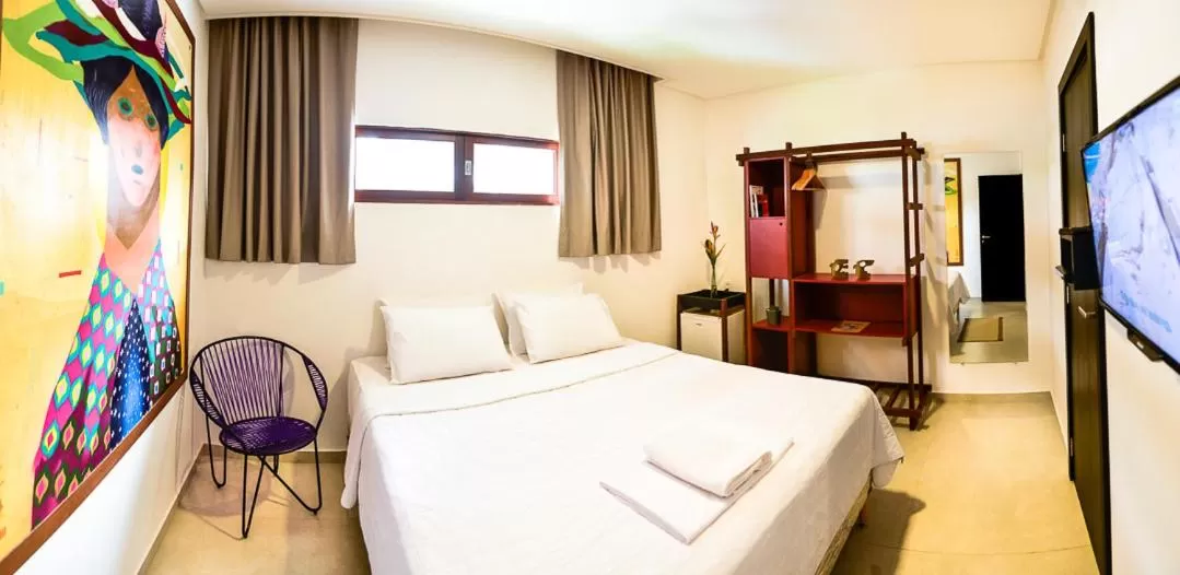 Bed in Xilo Design Hotel