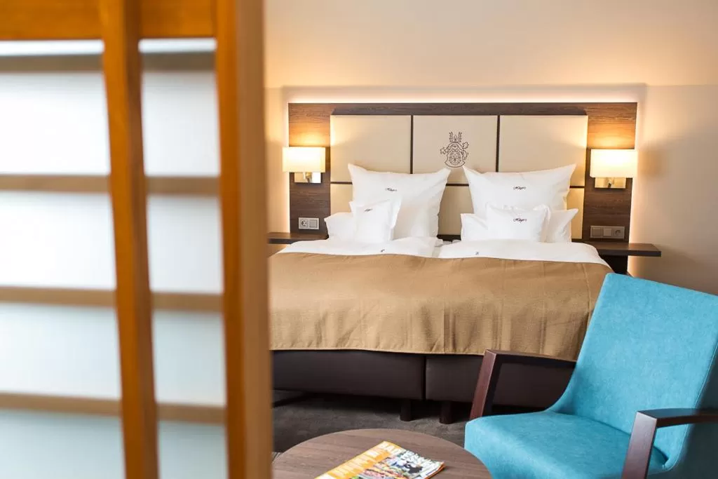 Photo of the whole room, Bed in Höger's Hotel & Restaurant