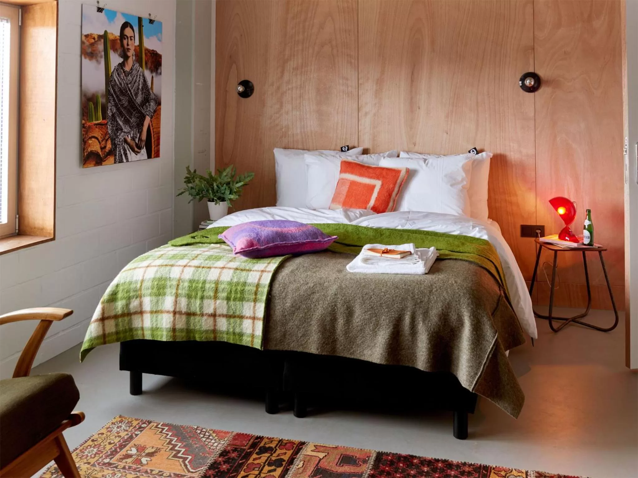 Bed in Q-Factory Hotel