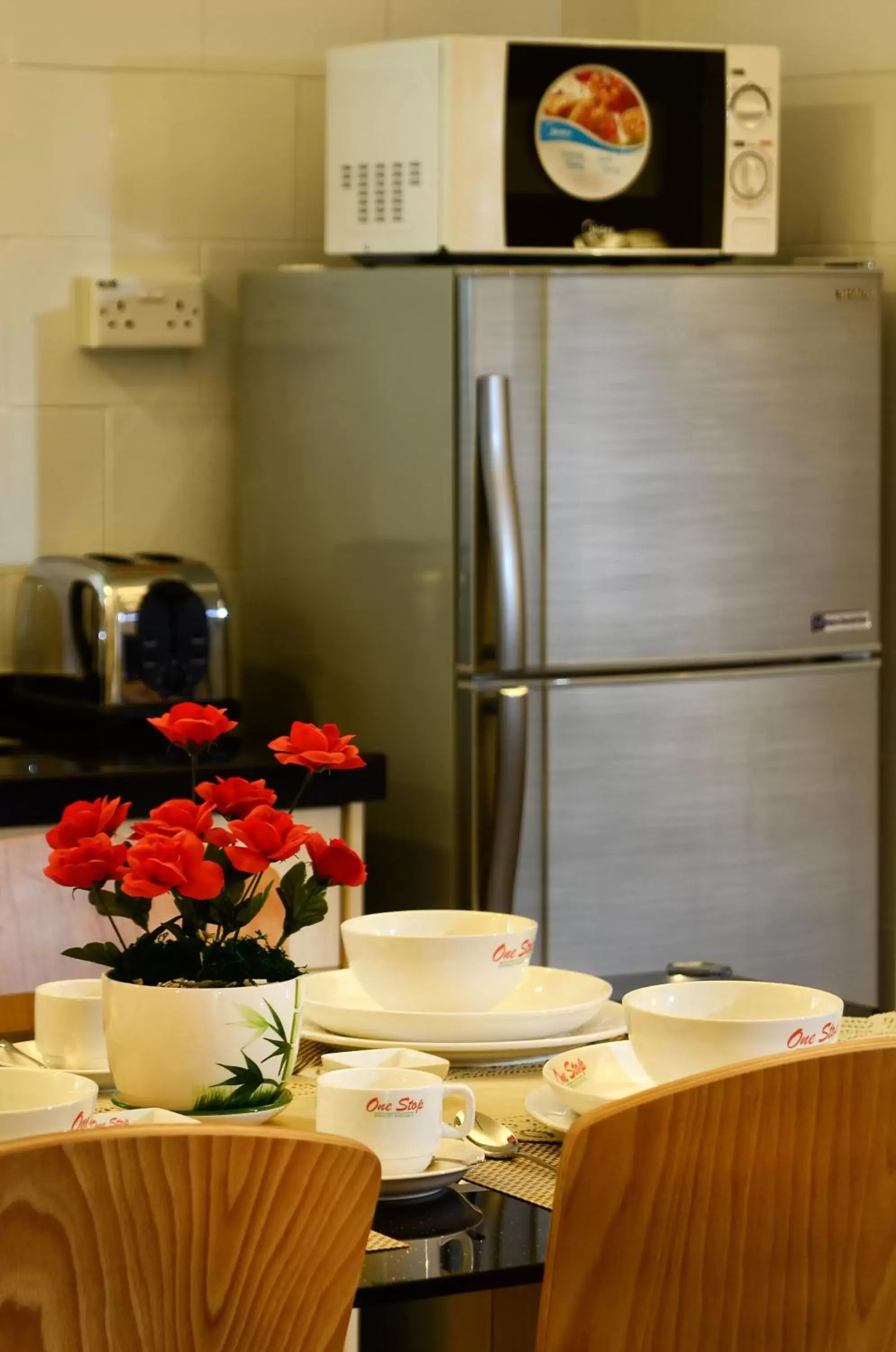 Dining area in One-Stop Residence & Hotel