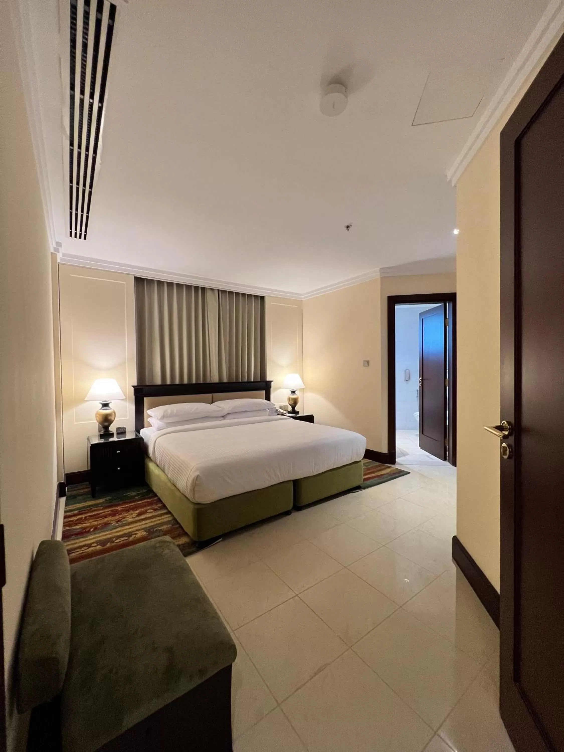 Bedroom, Bed in City Seasons Suites