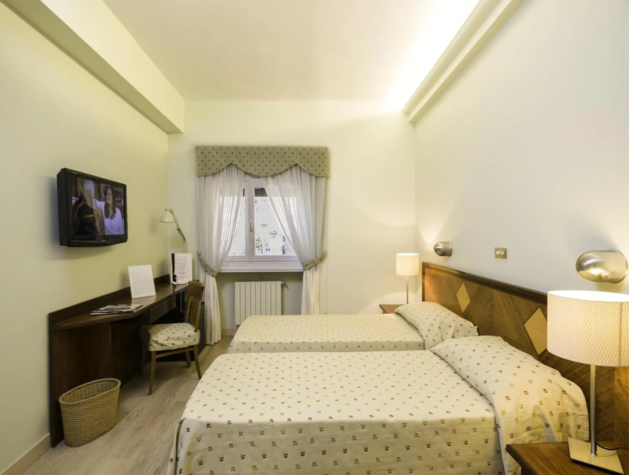 Bed in Hotel Cacciani