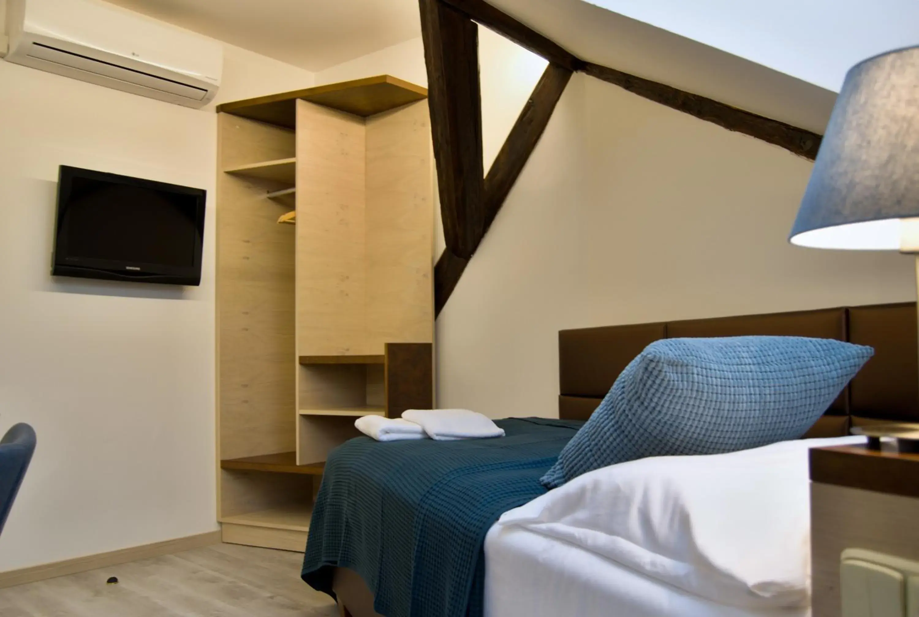 Bedroom, Bed in U Medvidku-Brewery Hotel
