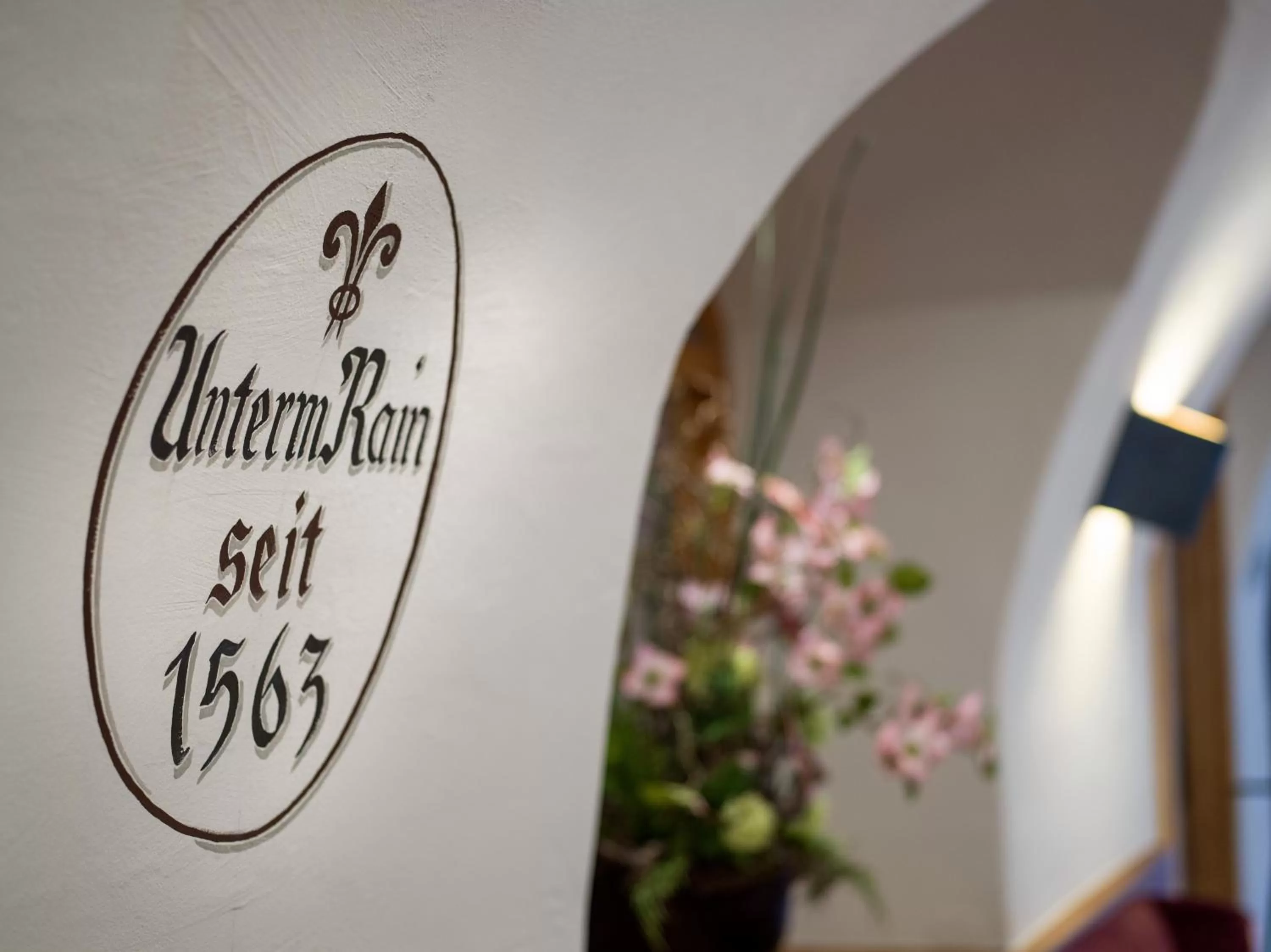 Property logo or sign in Alpen Glück Hotel Unterm Rain garni