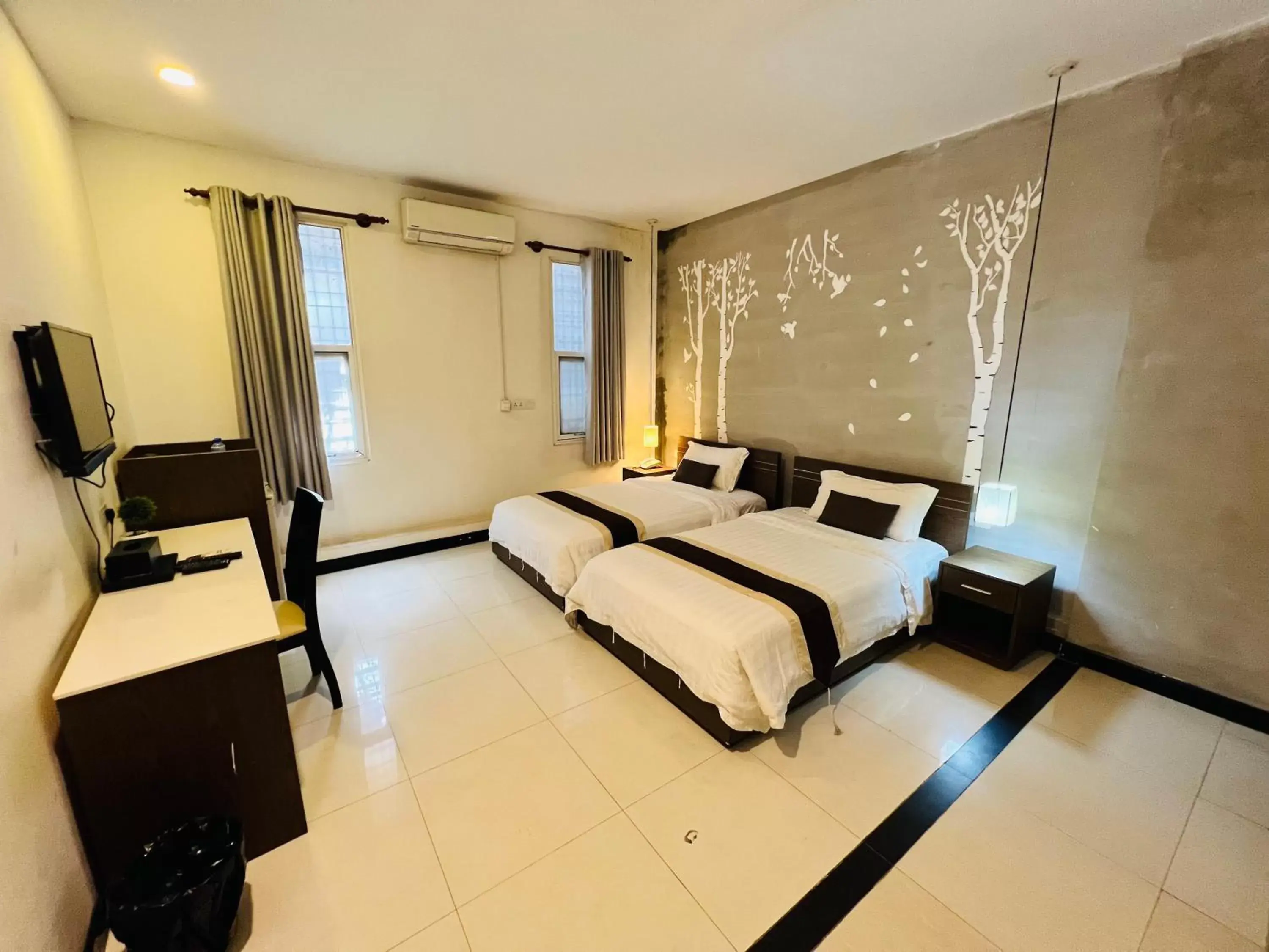 Bedroom in Asiban Quay Boutique Hotel