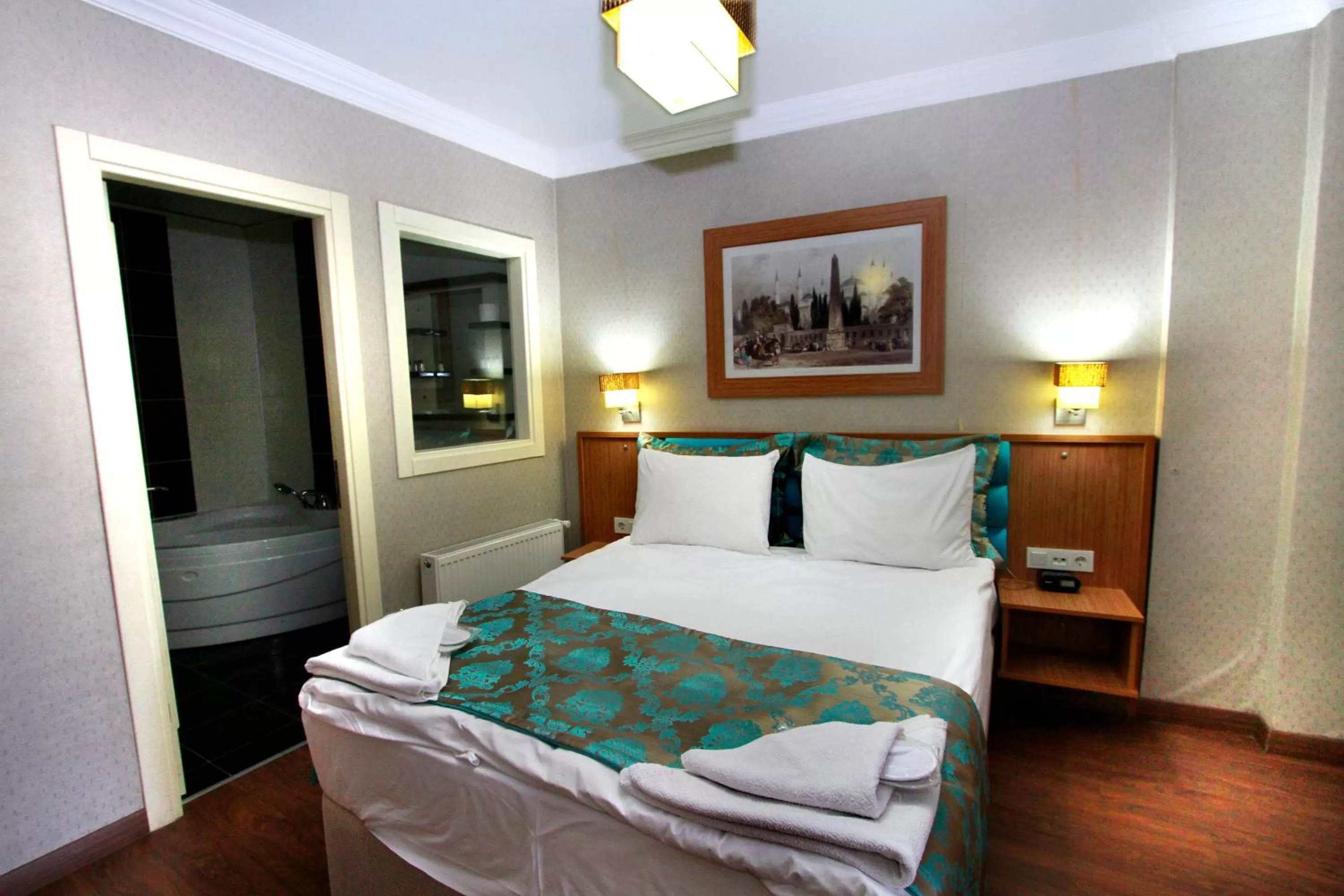 Bed in Agora Boutique Hotel & Bistro