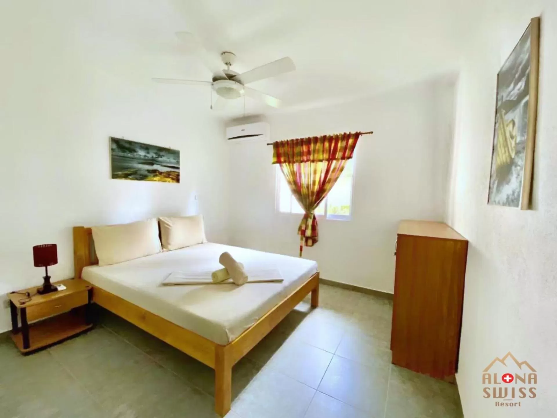 Bed in Alona Swiss Resort