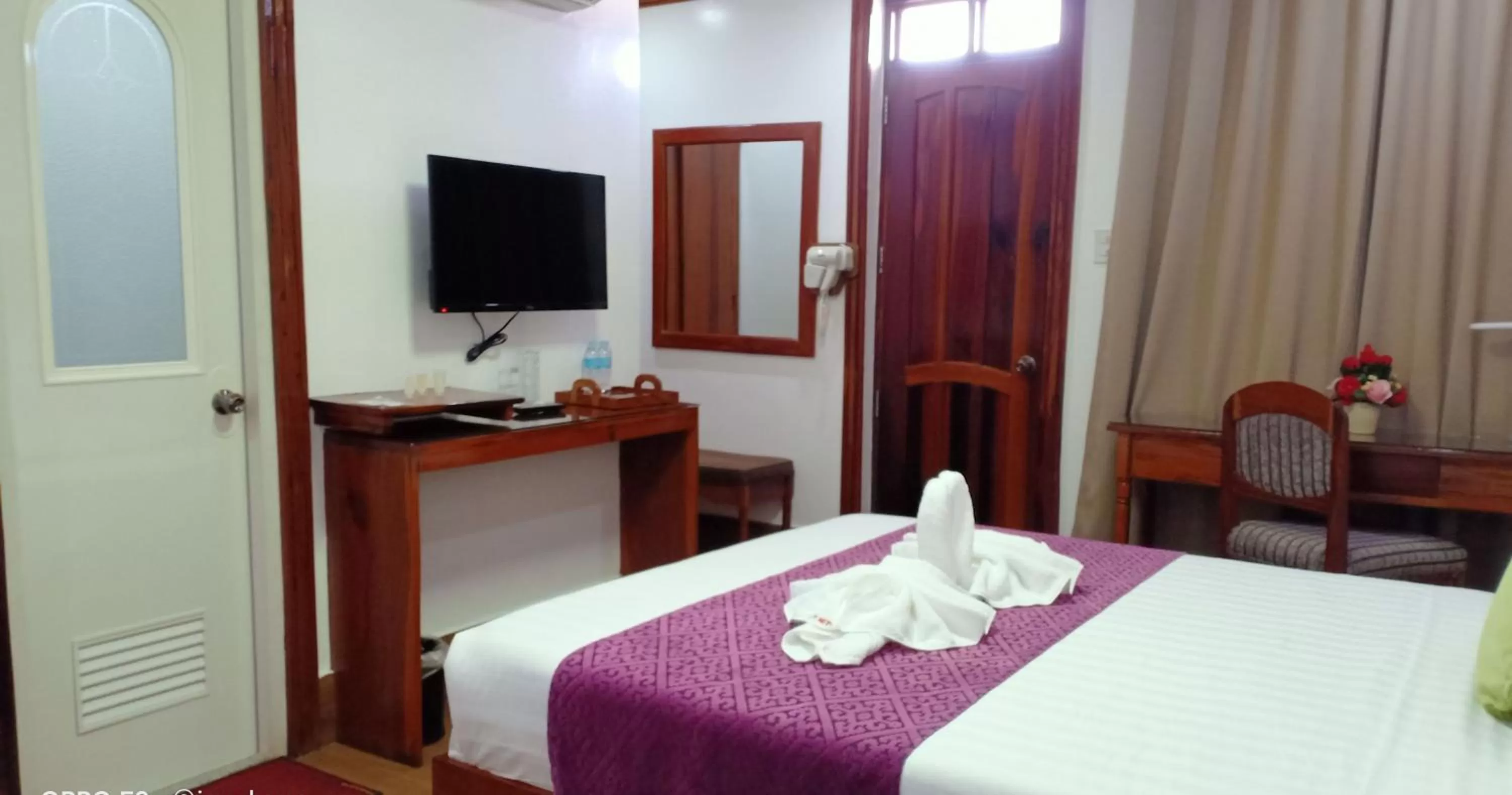 Bed in CLN Boutique Hotel