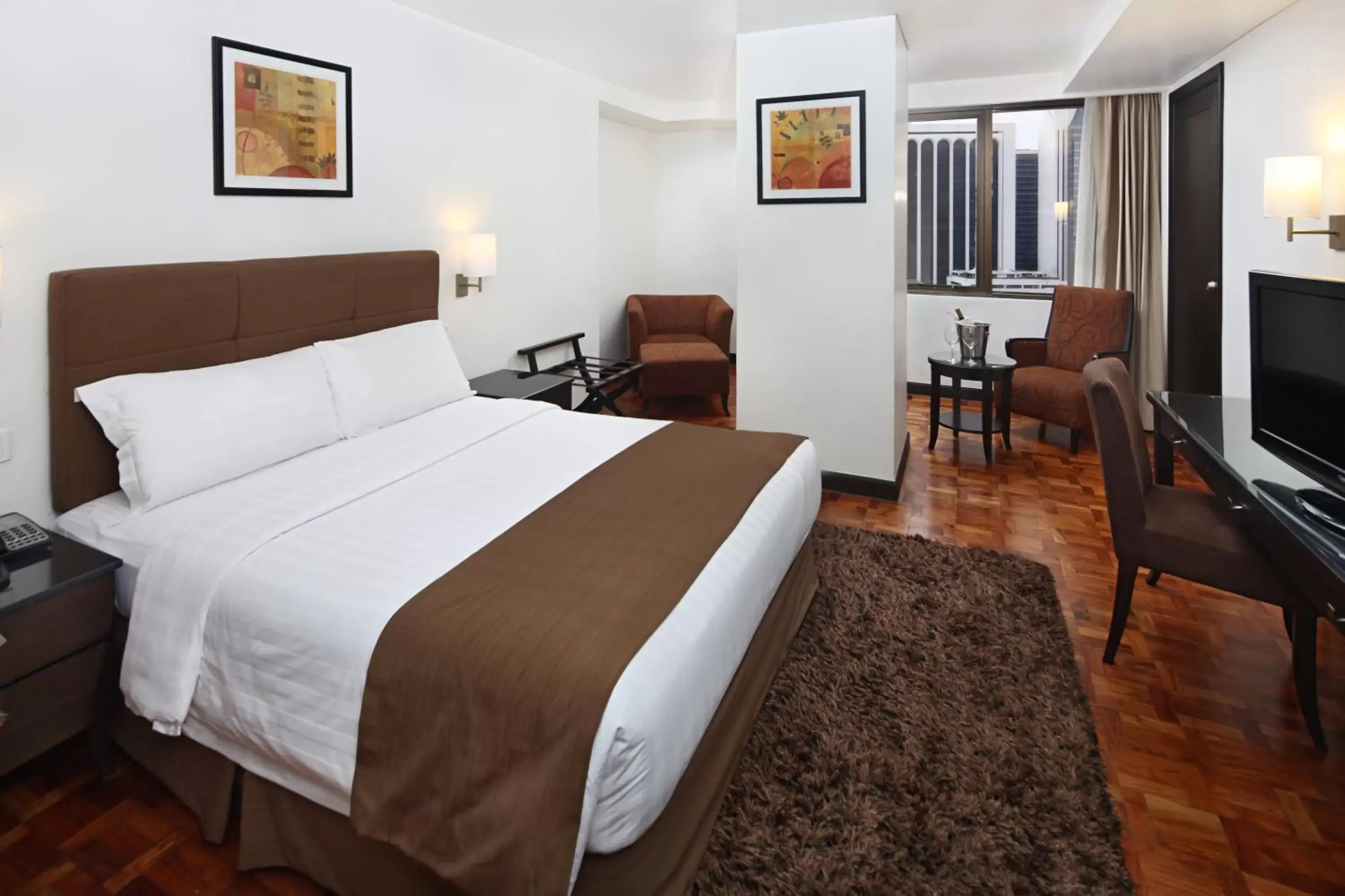 Bed in City Garden Hotel Makati