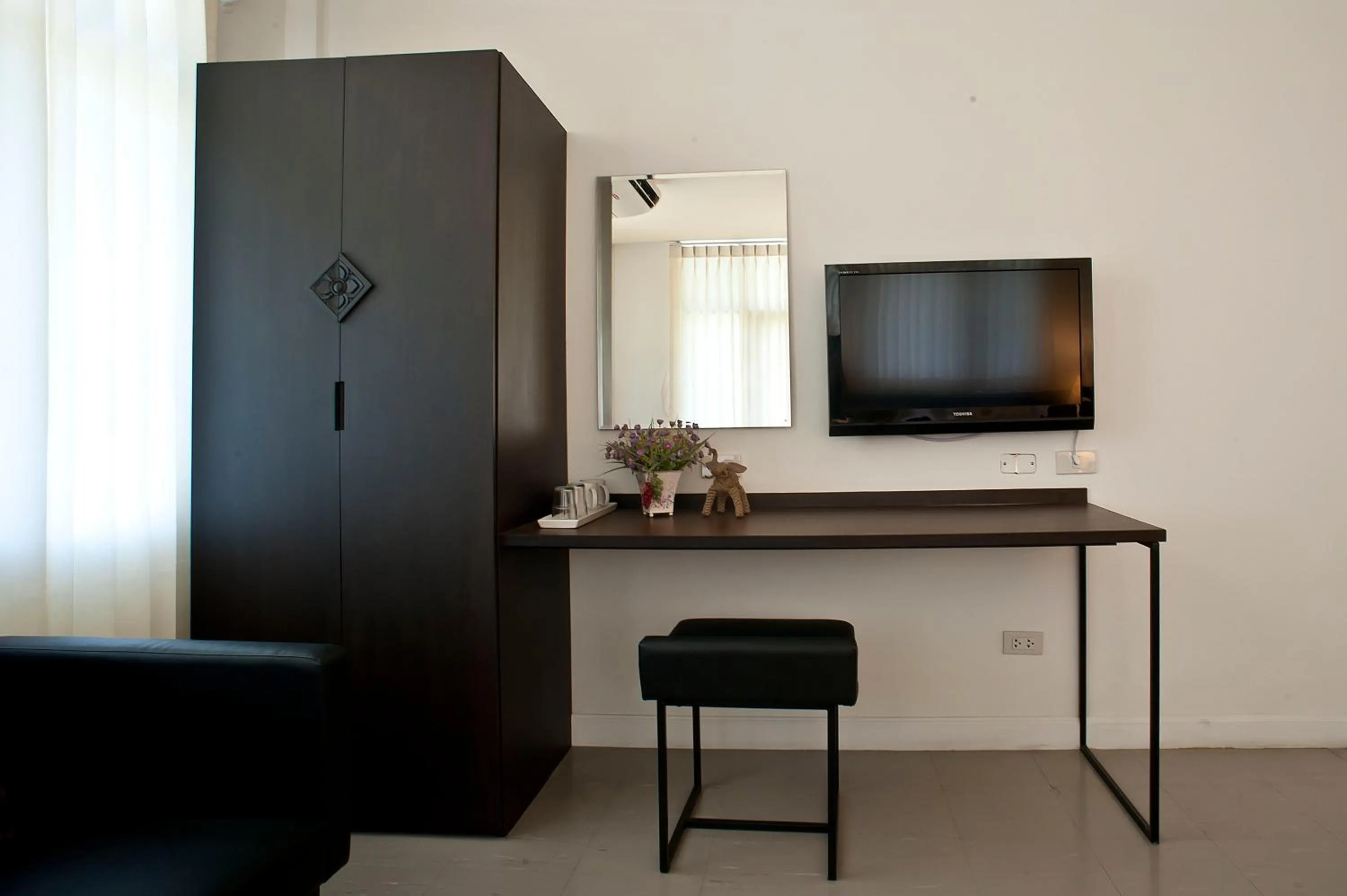 TV and multimedia, TV/Entertainment Center in G9 Bangkok Hotel