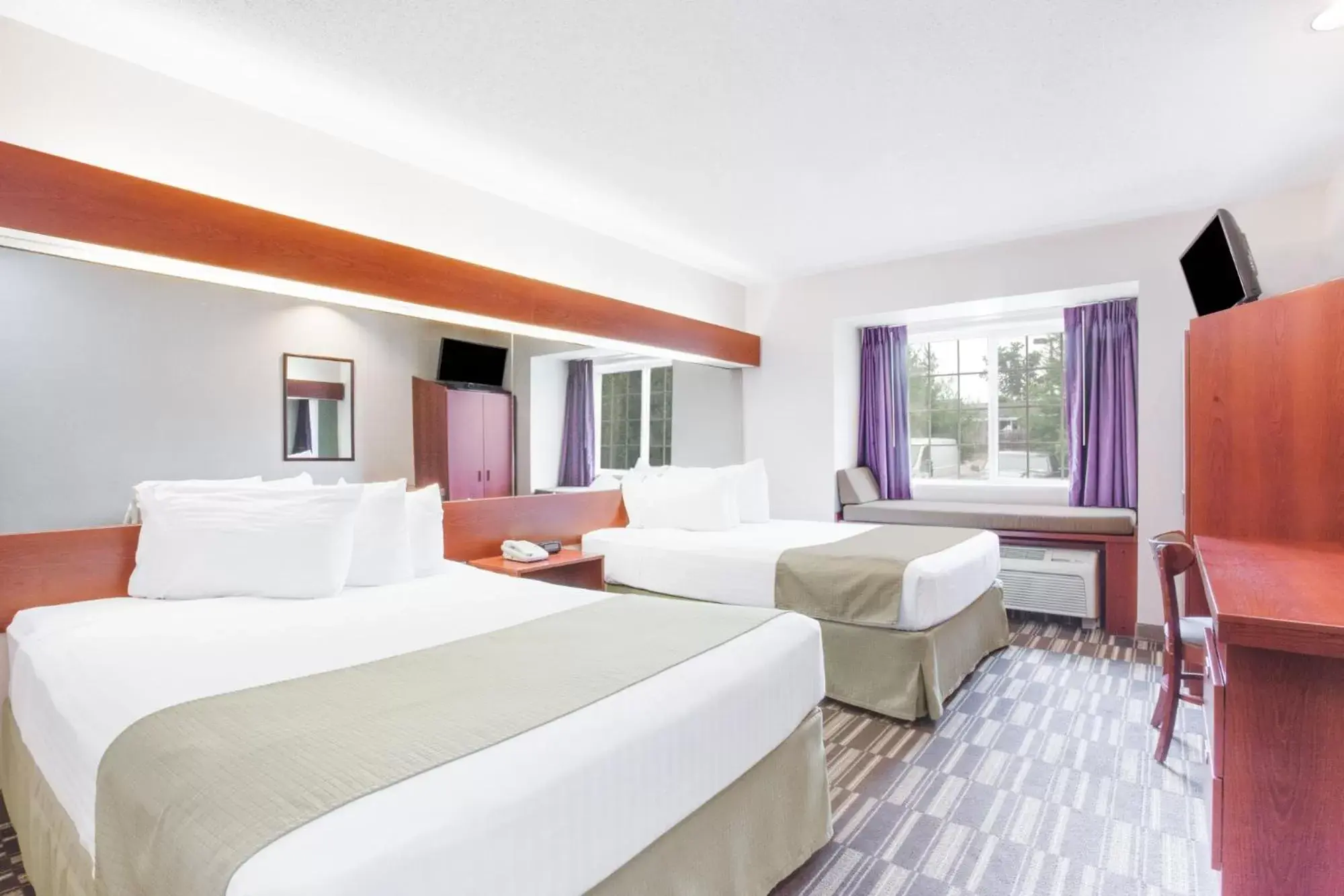 Bed in Microtel Inn & Suites by Wyndham Olean