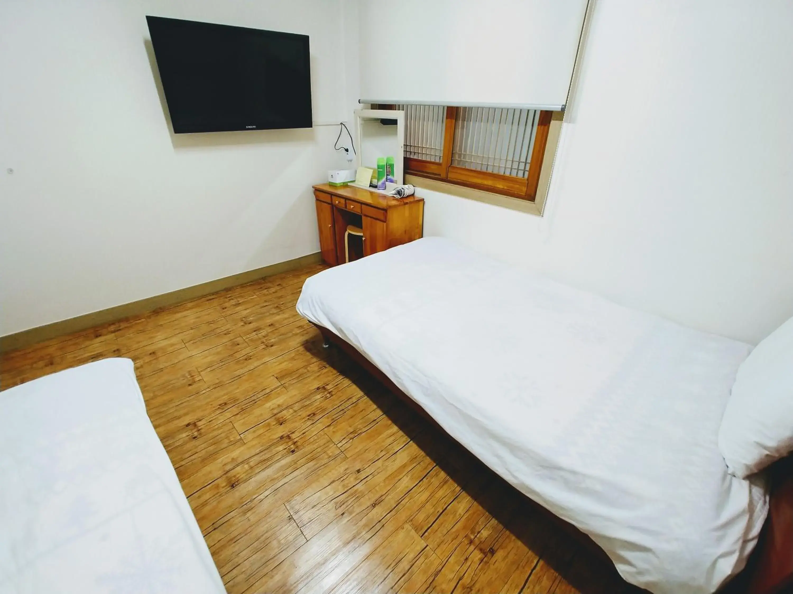 Bed in Masil Guesthouse Jeju