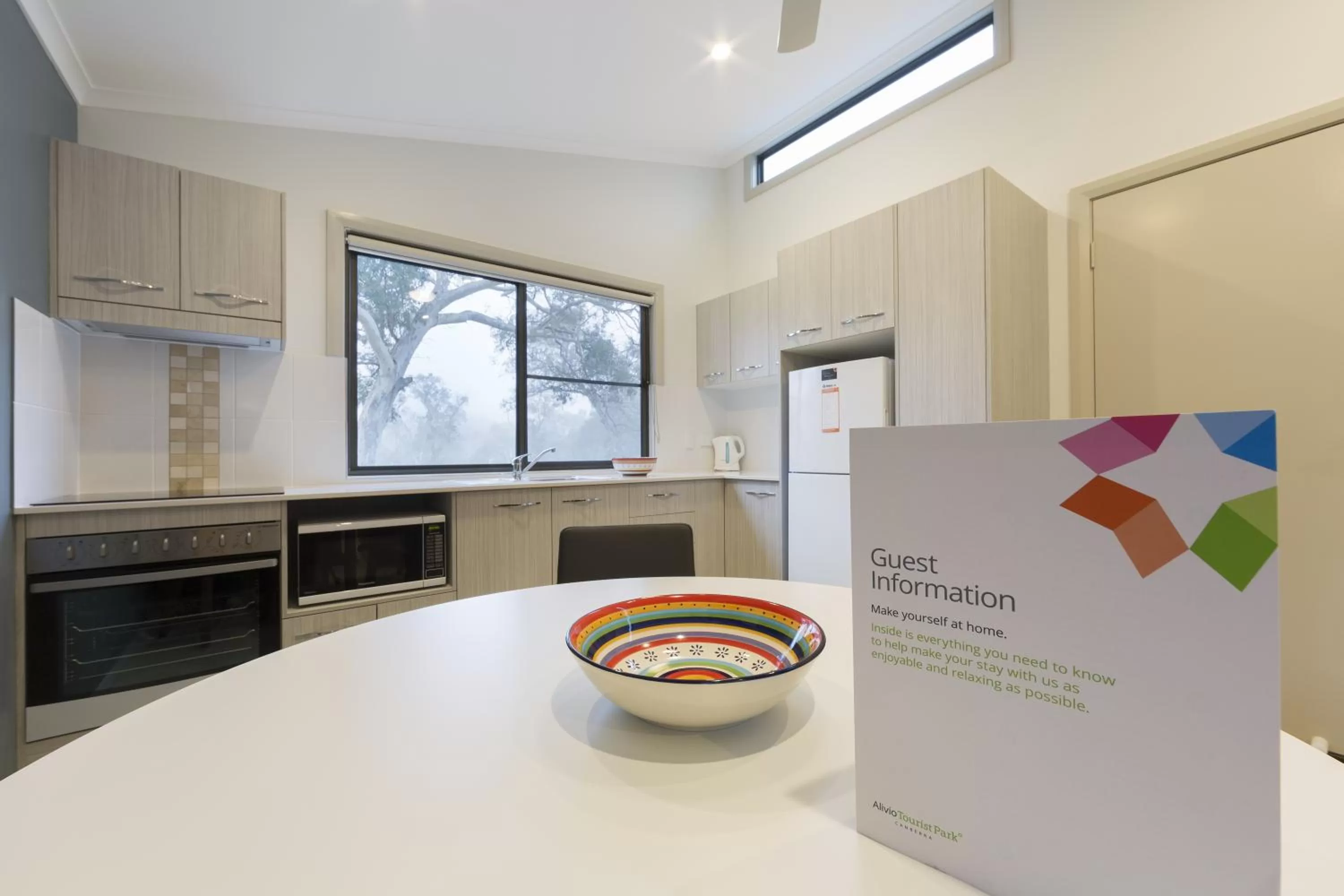 Kitchen or kitchenette in Alivio Tourist Park Canberra