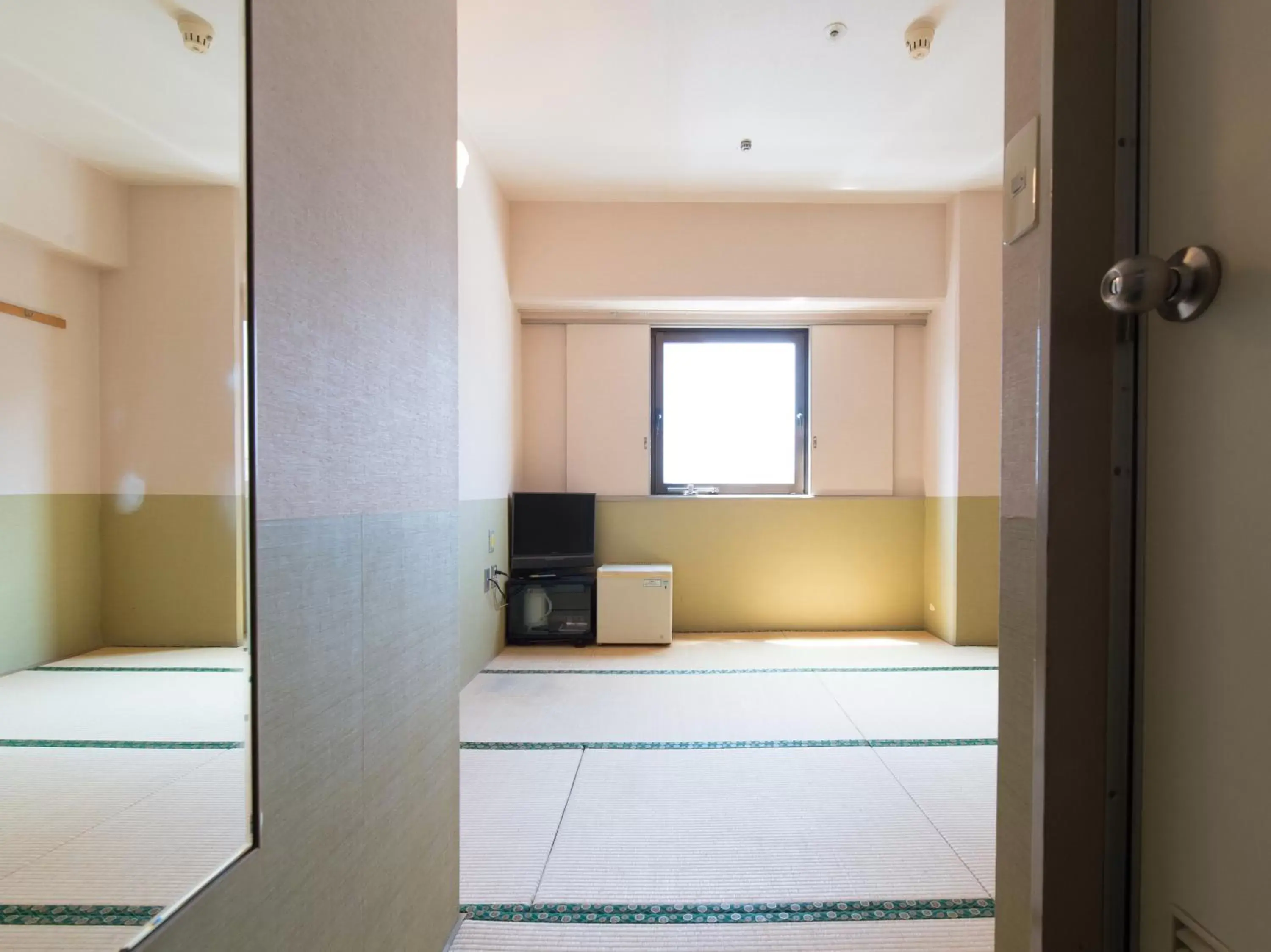 Photo of the whole room, Kitchen/Kitchenette in Tabist Hotel Tetora Kitakyushu