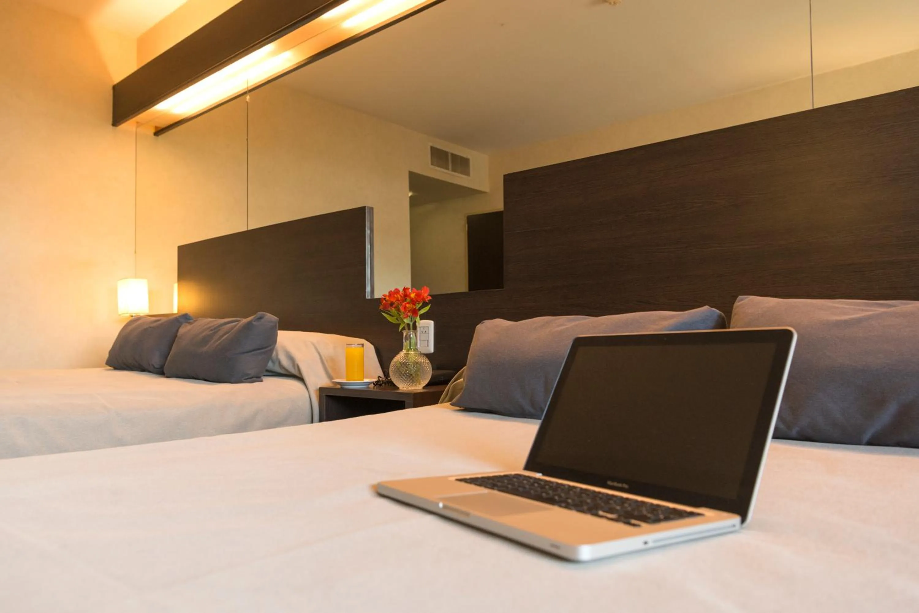 Decorative detail, Bed in Hathor Hotels Mendoza