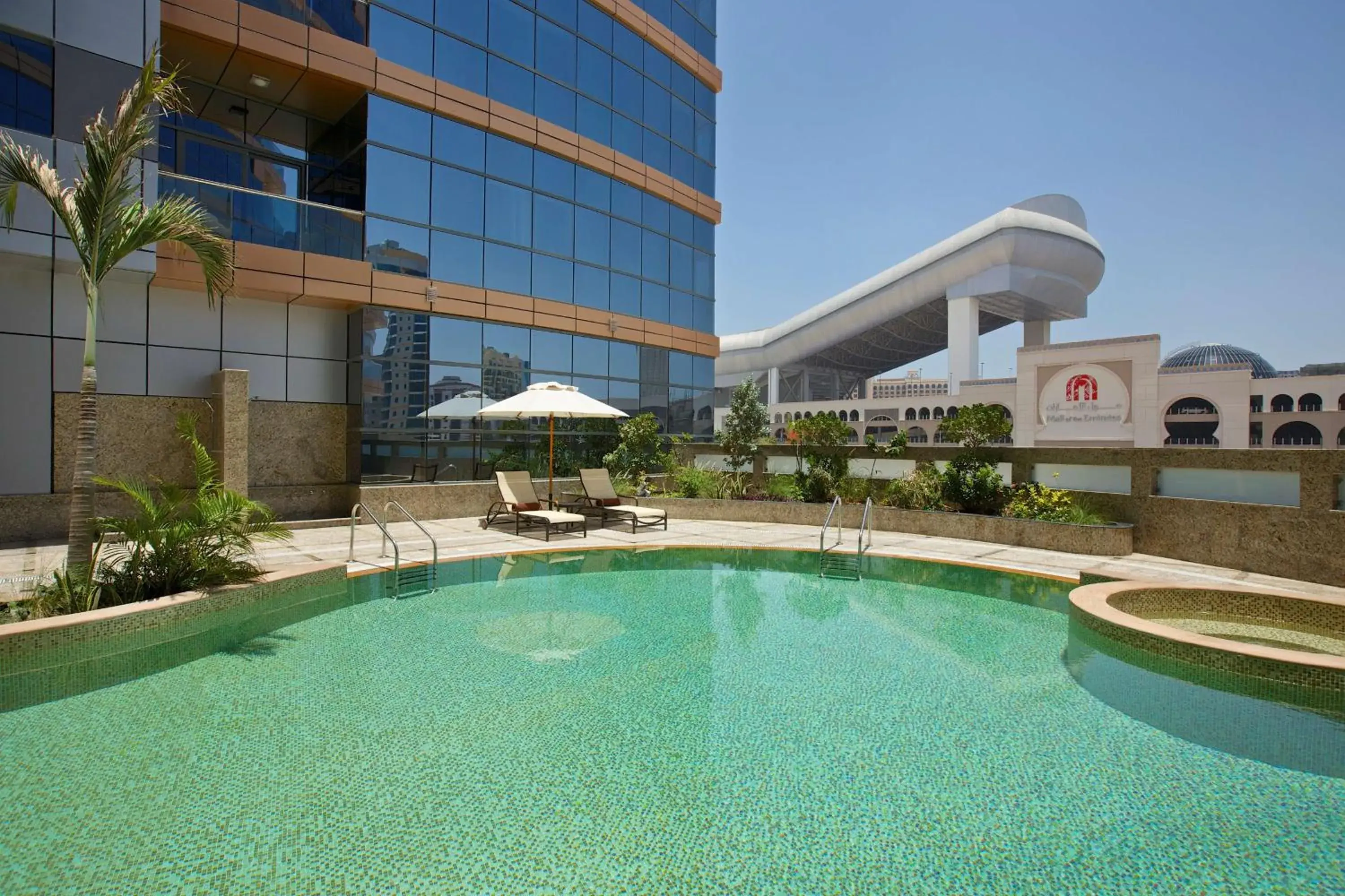 Pool view, Property Building in DoubleTree by Hilton Hotel and Residences Dubai – Al Barsha