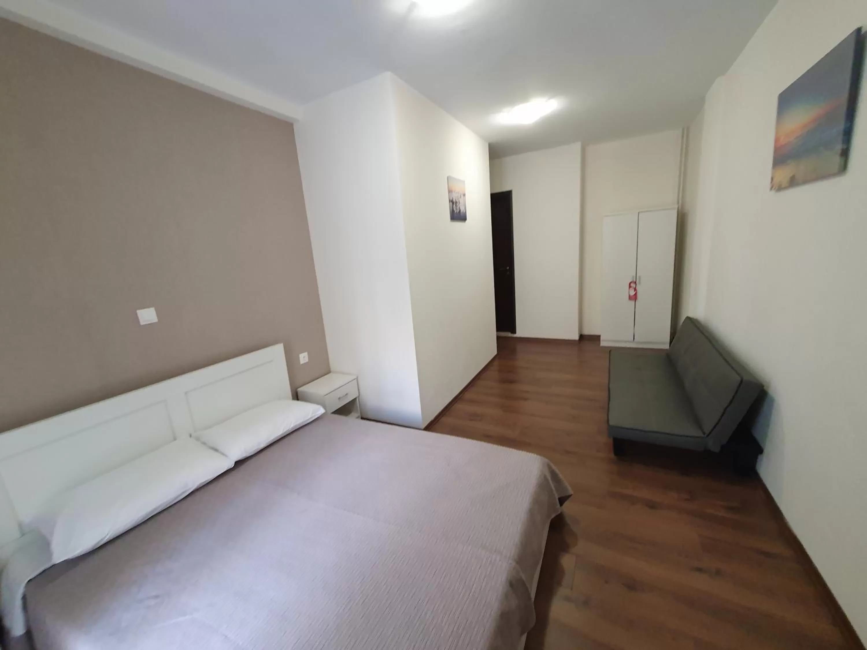 Decorative detail, Bed in Athens Center Solomou rooms