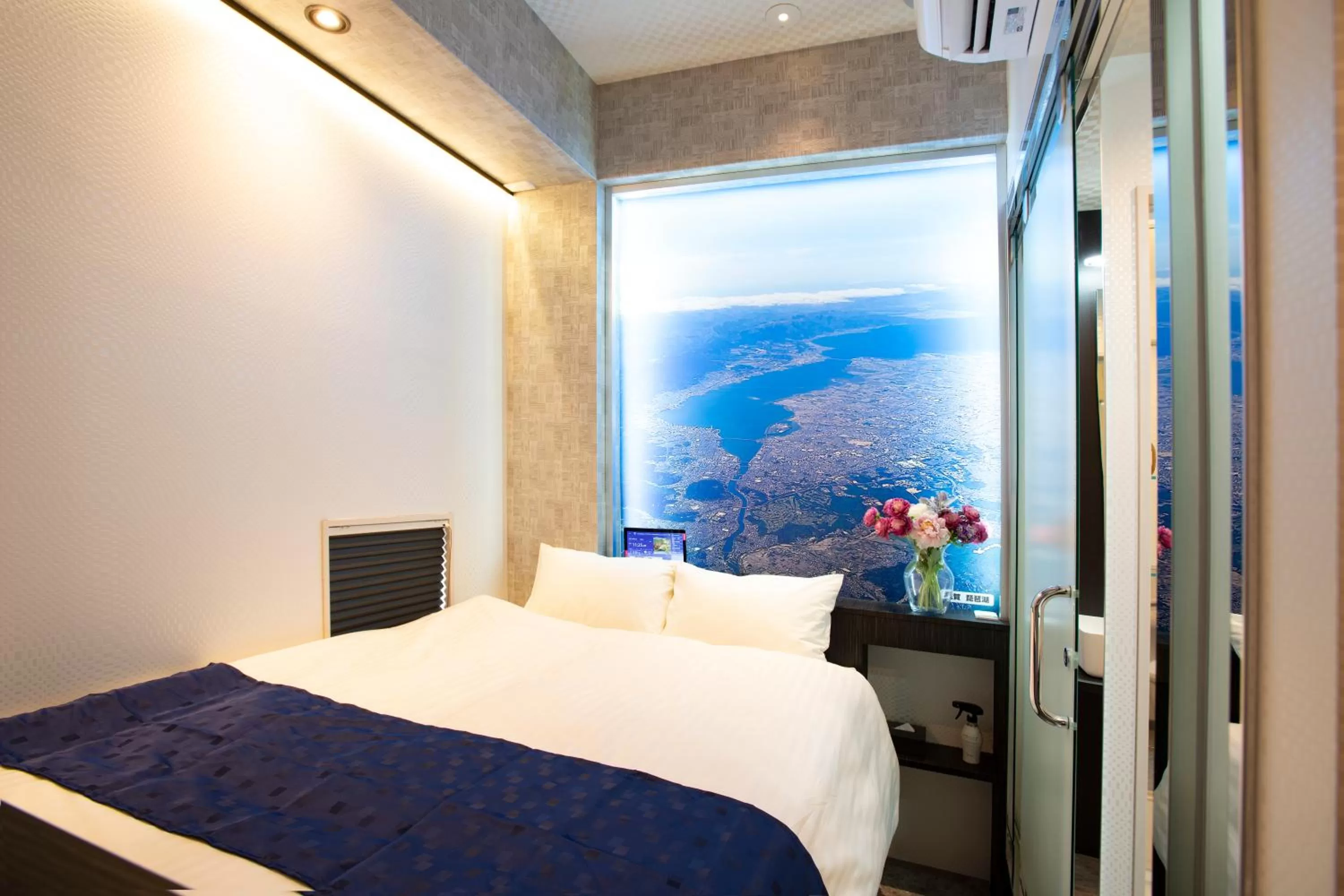 Bed in Hotel Xcell Hiroshima Nagarekawa