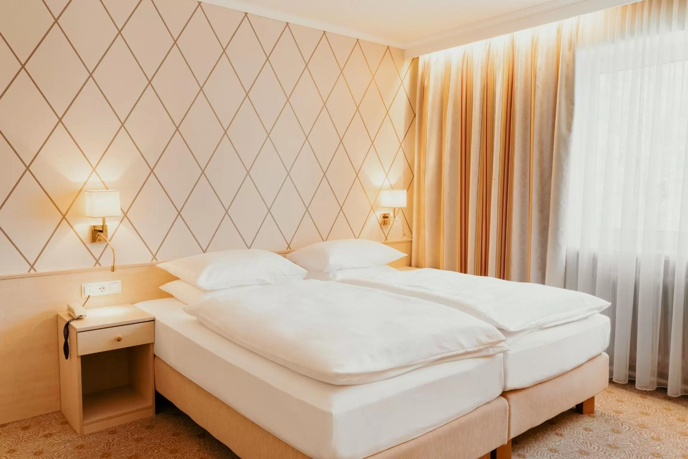 Bed in Hotel Scherer