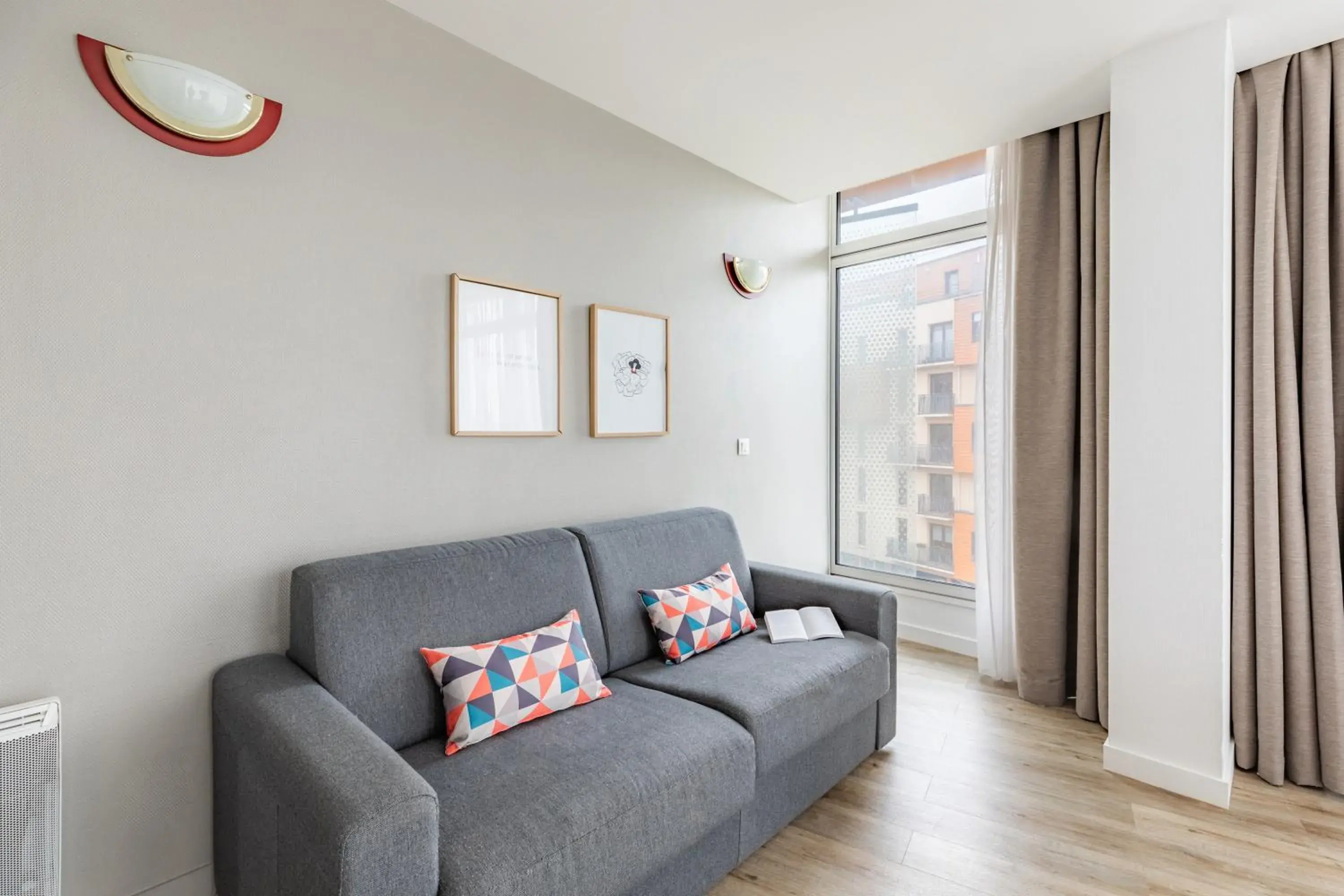 Living room in Appart'City Confort Le Mans Centre Living room in Appart'City Confort Le Mans Centre